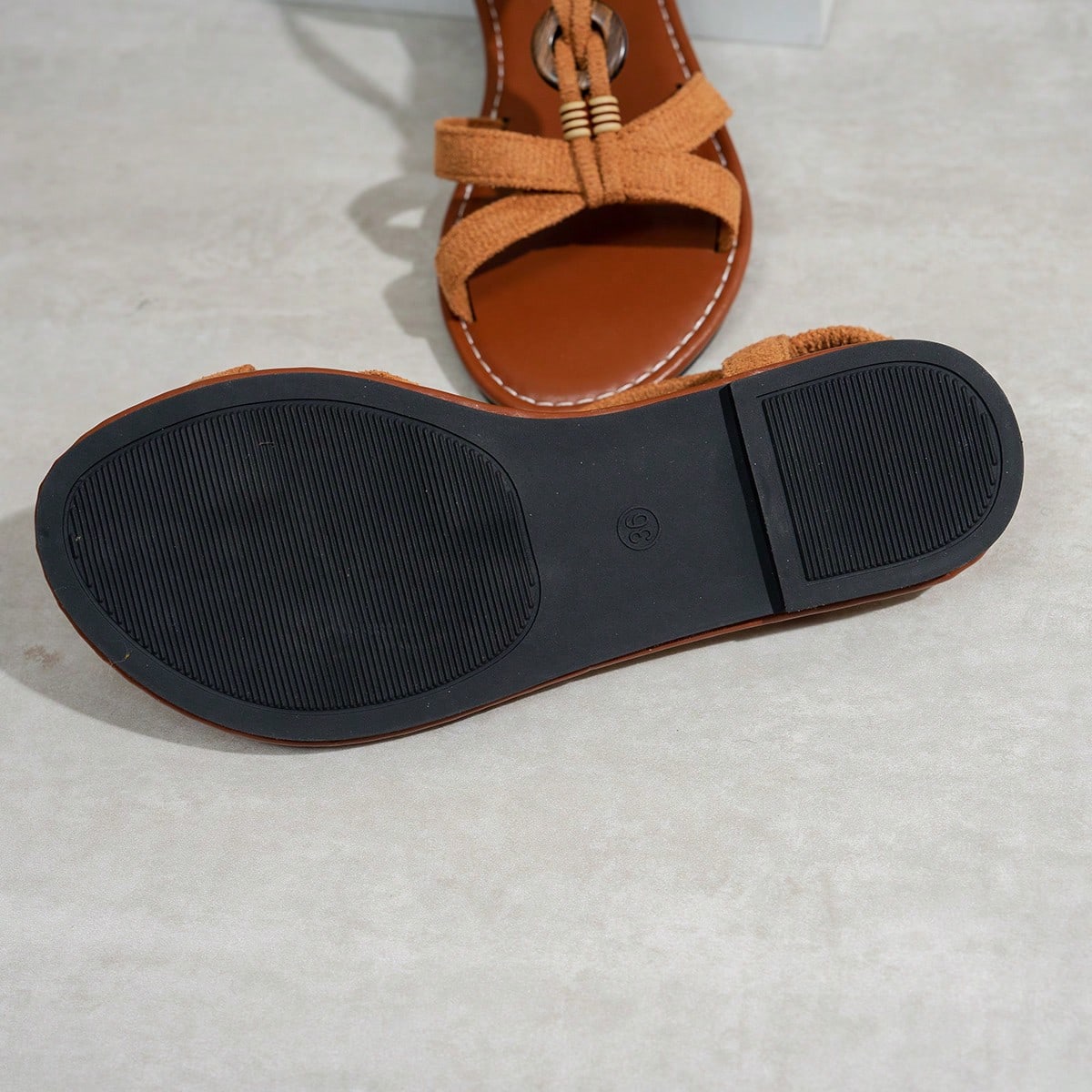 Women's beaded open-toe thong flat sandals in slip-on style for outdoor and beach casual wear.