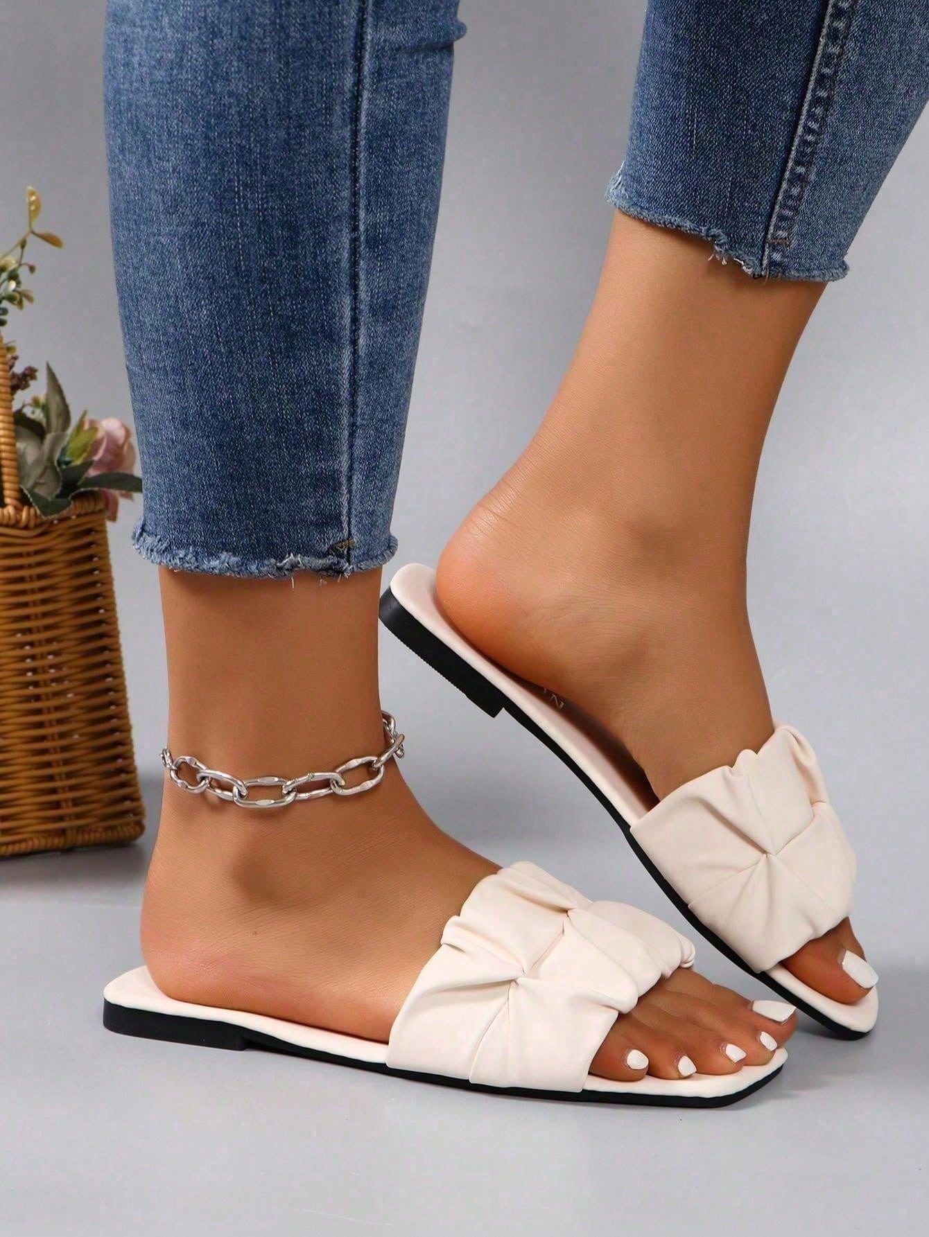 Women's flat slip-on sandals with a square open toe and ruched upper detail, casual non-slip slide style for beach, home, office, and outdoor wear.