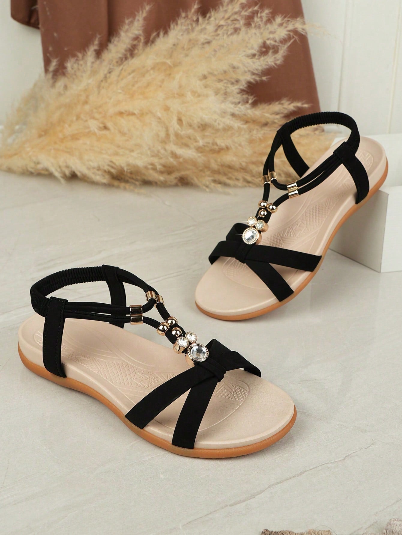 Women's open-toe flat slide sandals with a thick bottom, elastic strap detail, soft midsole, and anti-slip sole for casual beach and outdoor wear.