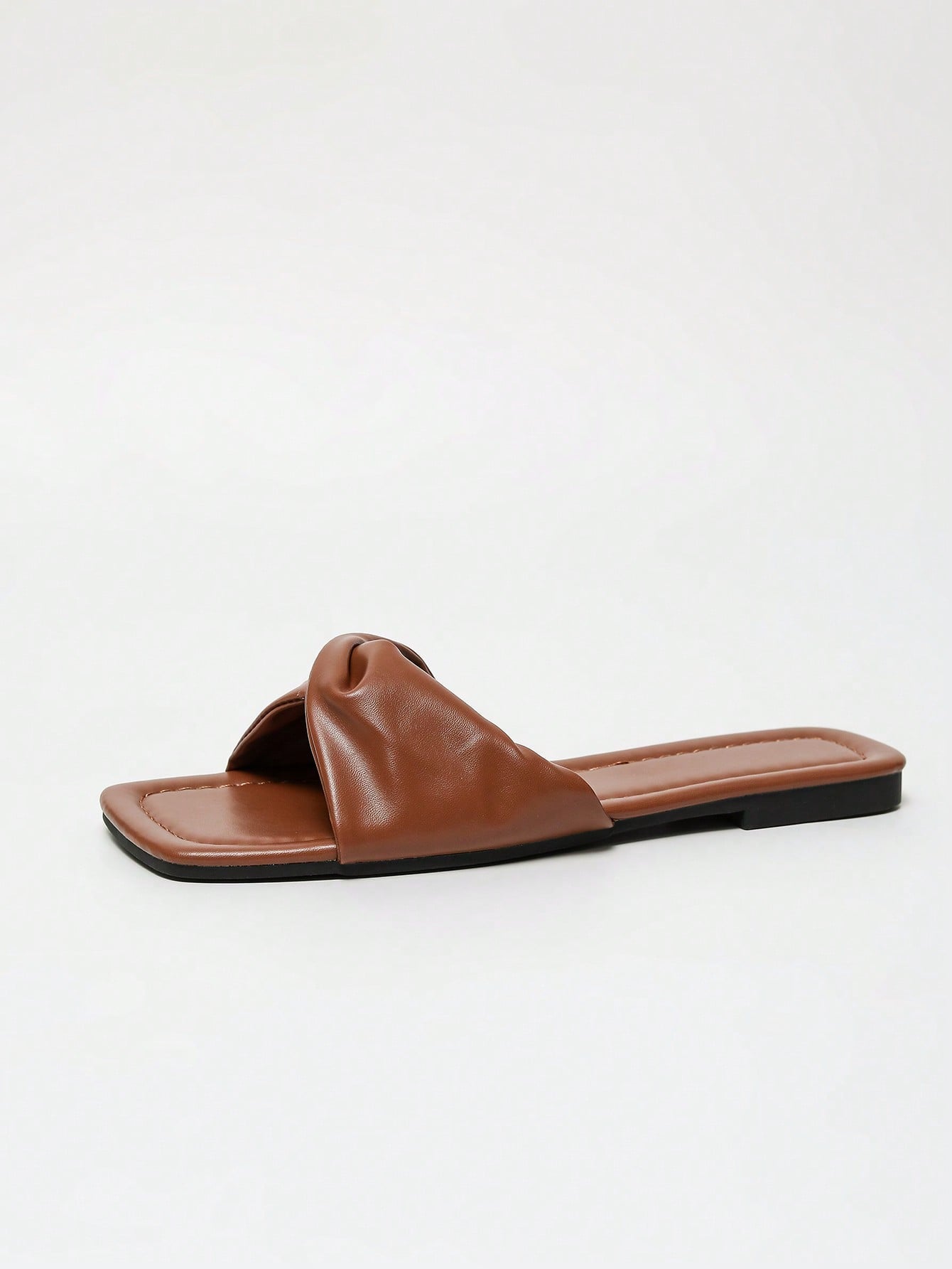 Women's white flat thong slide sandals with open square toe and twist detail, casual elegant style for home wear.