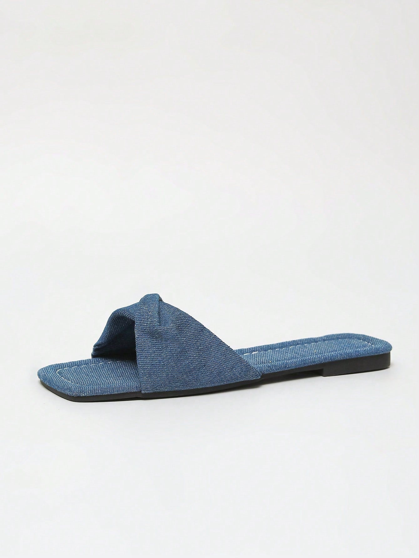 Women's white flat thong slide sandals with open square toe and twist detail, casual elegant style for home wear.