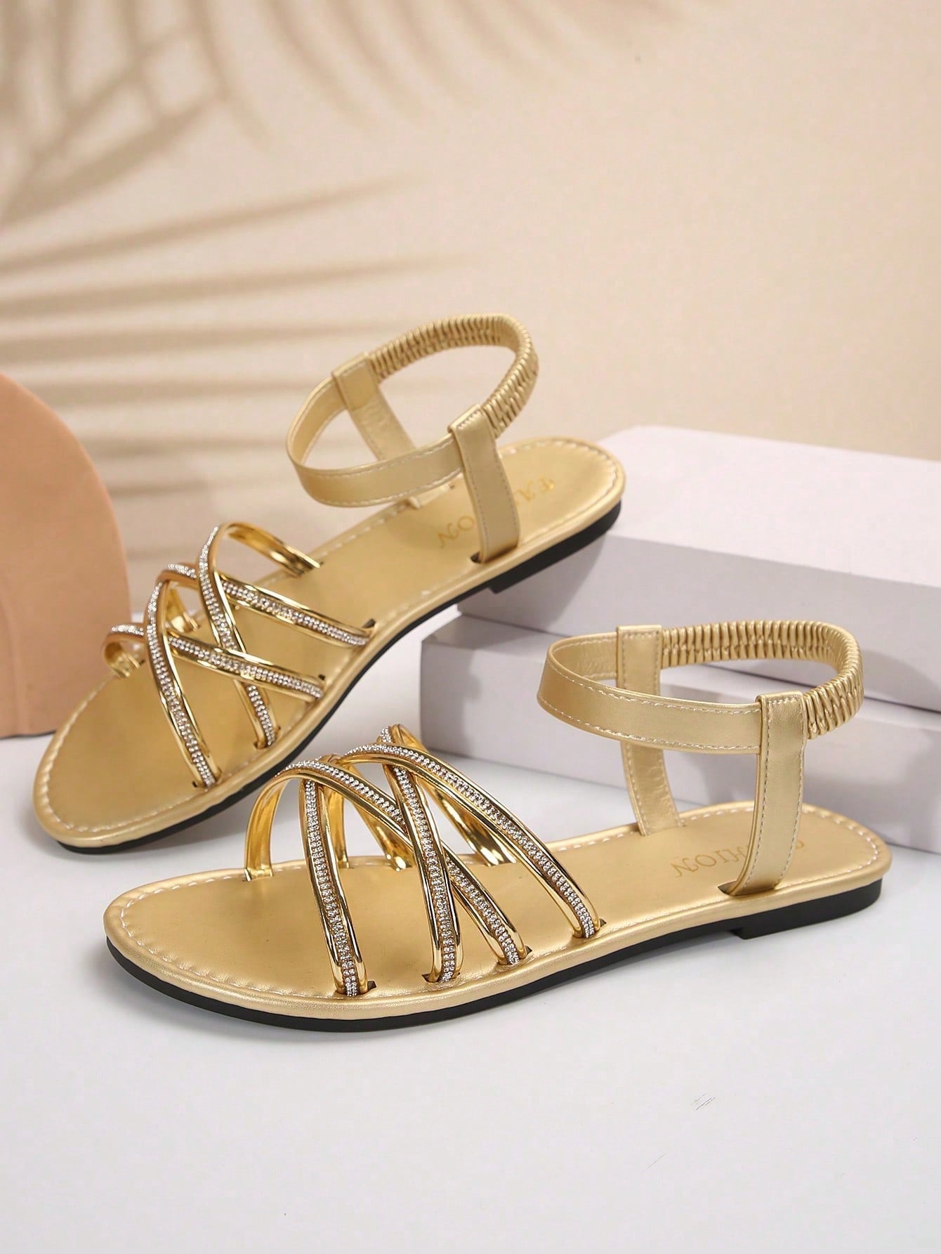 Plus size women's flat slide sandals with criss-cross straps, open toe, elastic band, and rhinestone detail, suitable for casual beach, vacation, and summer outdoor wear.