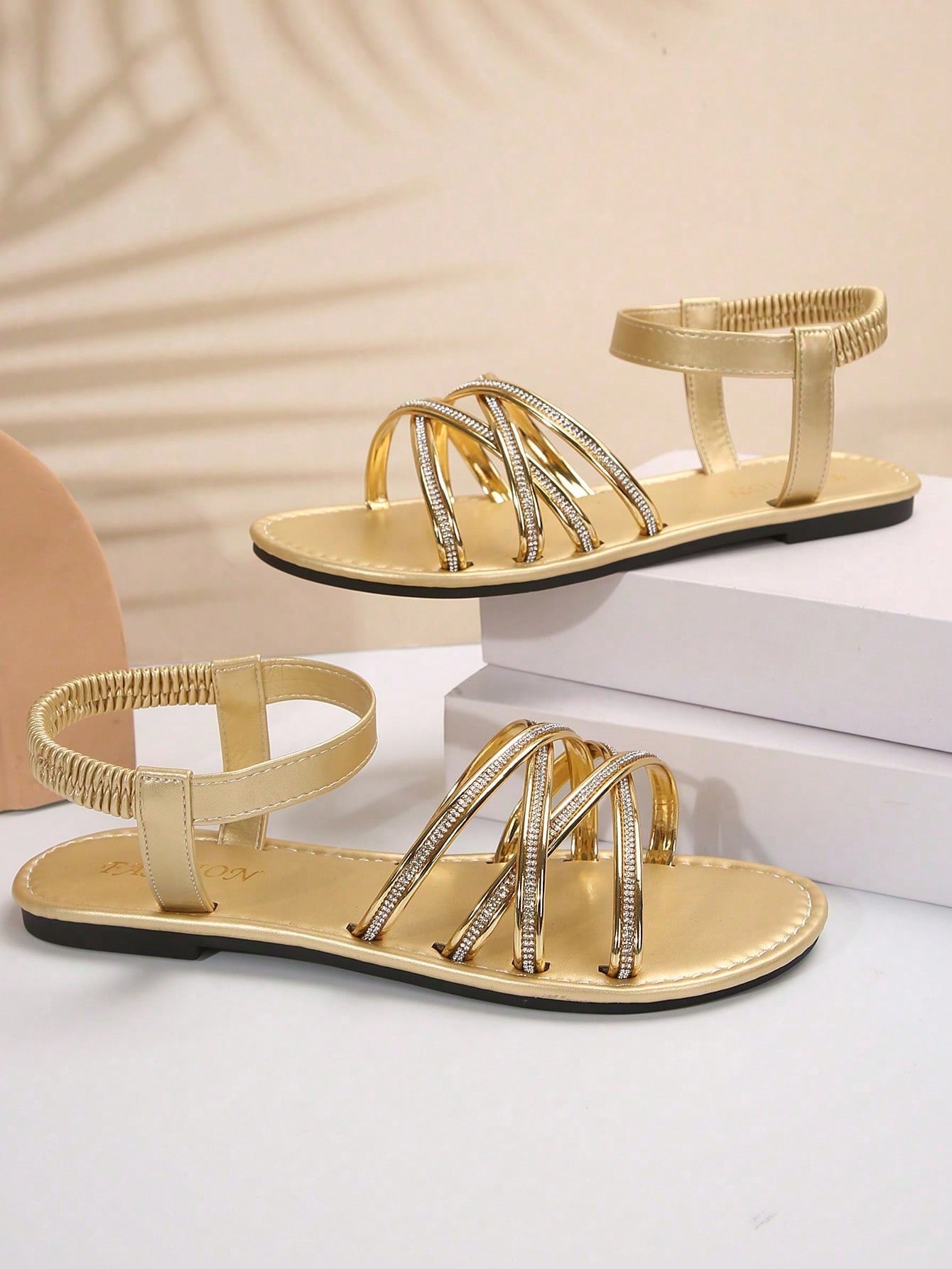 Plus size women's flat slide sandals with criss-cross straps, open toe, elastic band, and rhinestone detail, suitable for casual beach, vacation, and summer outdoor wear.