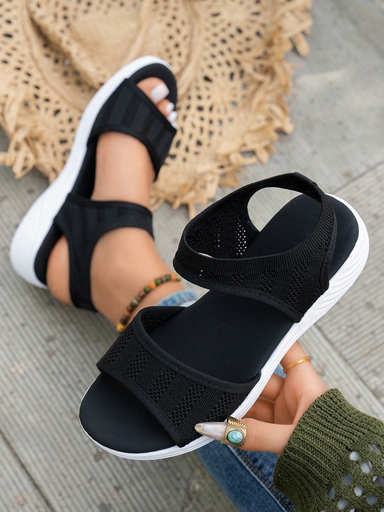 Women's slip-on Roman style platform sandals with breathable cut-out upper, open toe, and flat outdoor-ready sole.