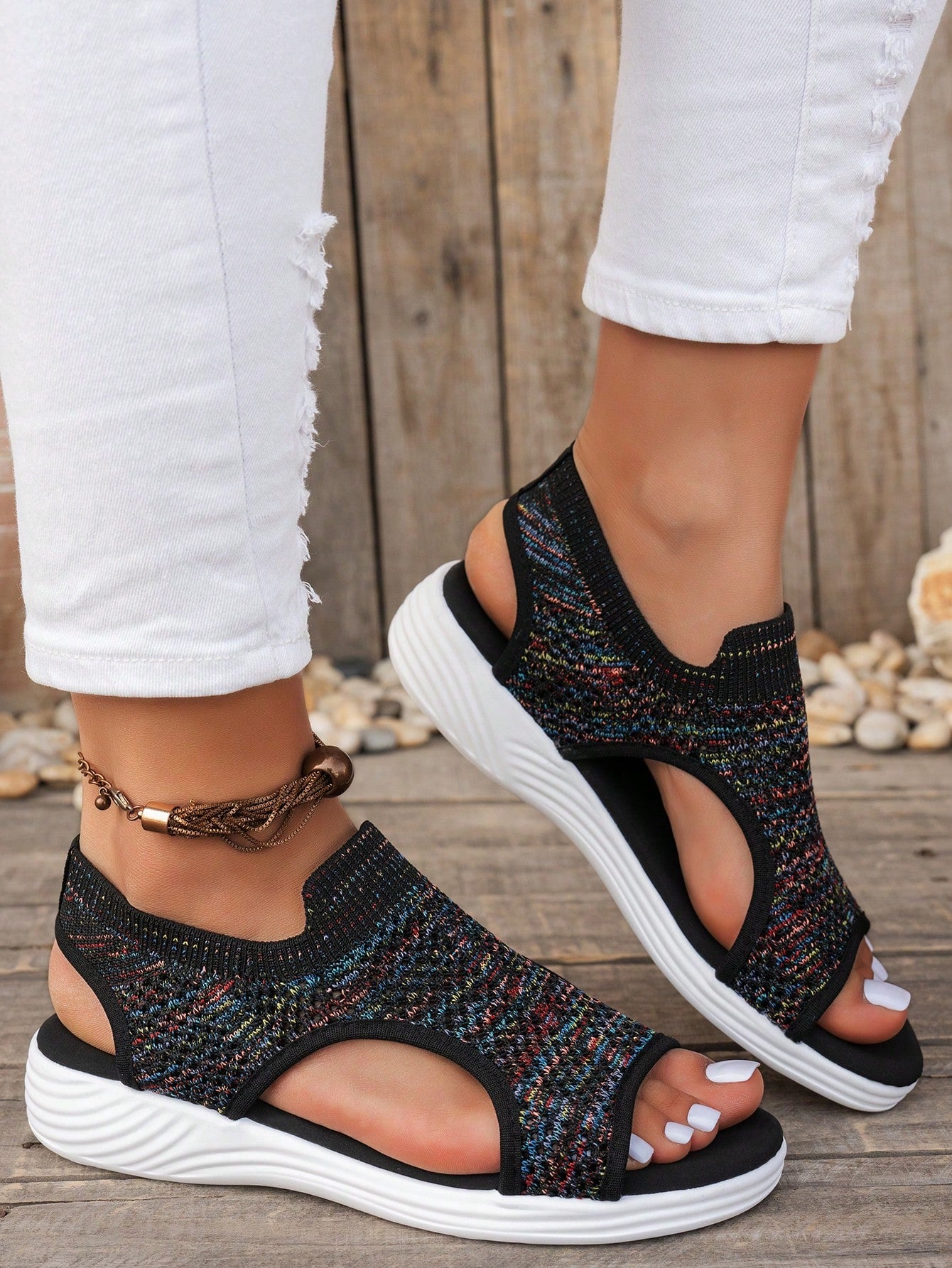 Plus size women's slip-on wedge slide sandals with open toe, low platform heel, and breathable cutout fabric upper, shown as a casual outdoor style sandal.