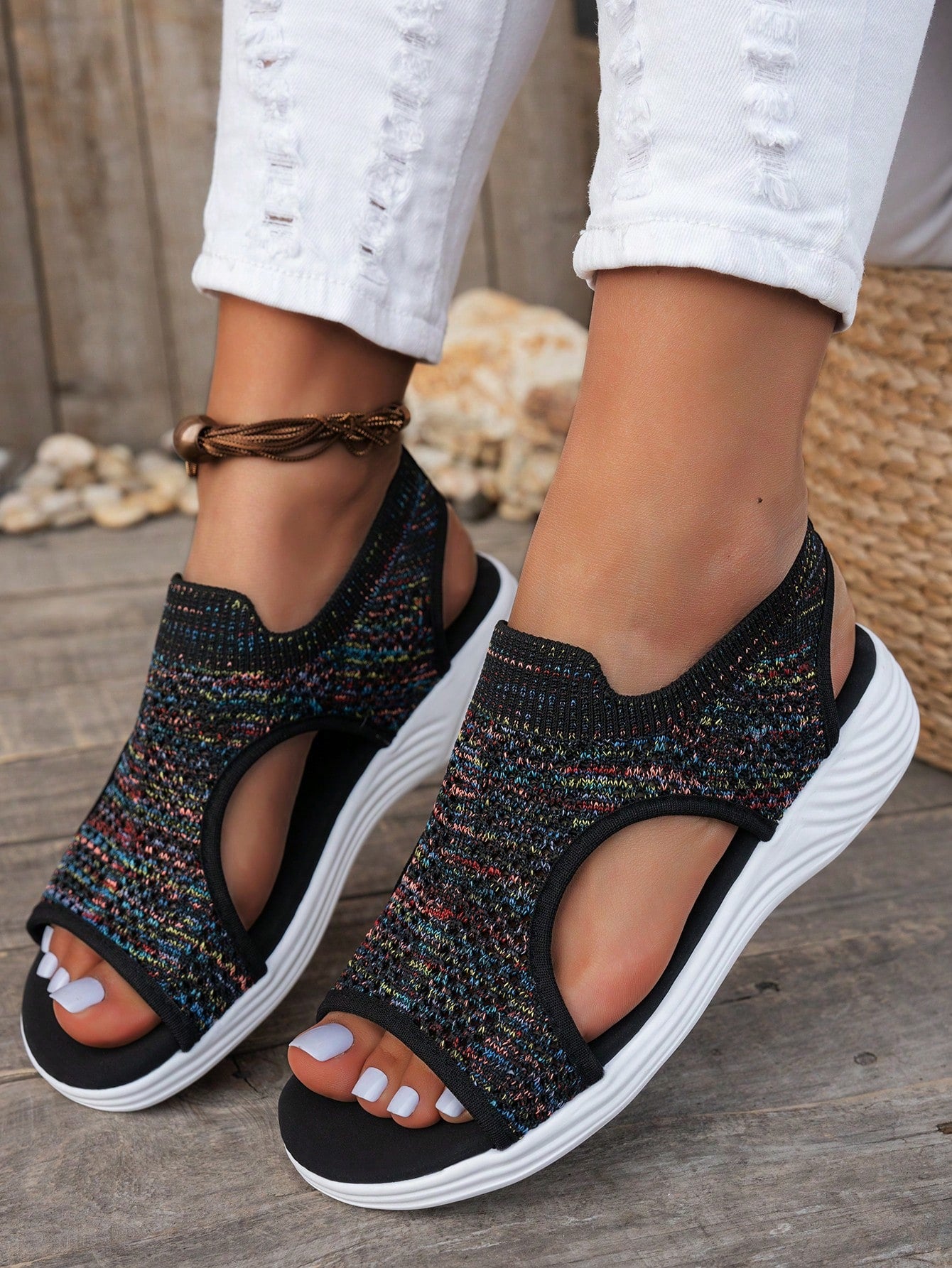 Plus size women's slip-on wedge slide sandals with open toe, low platform heel, and breathable cutout fabric upper, shown as a casual outdoor style sandal.