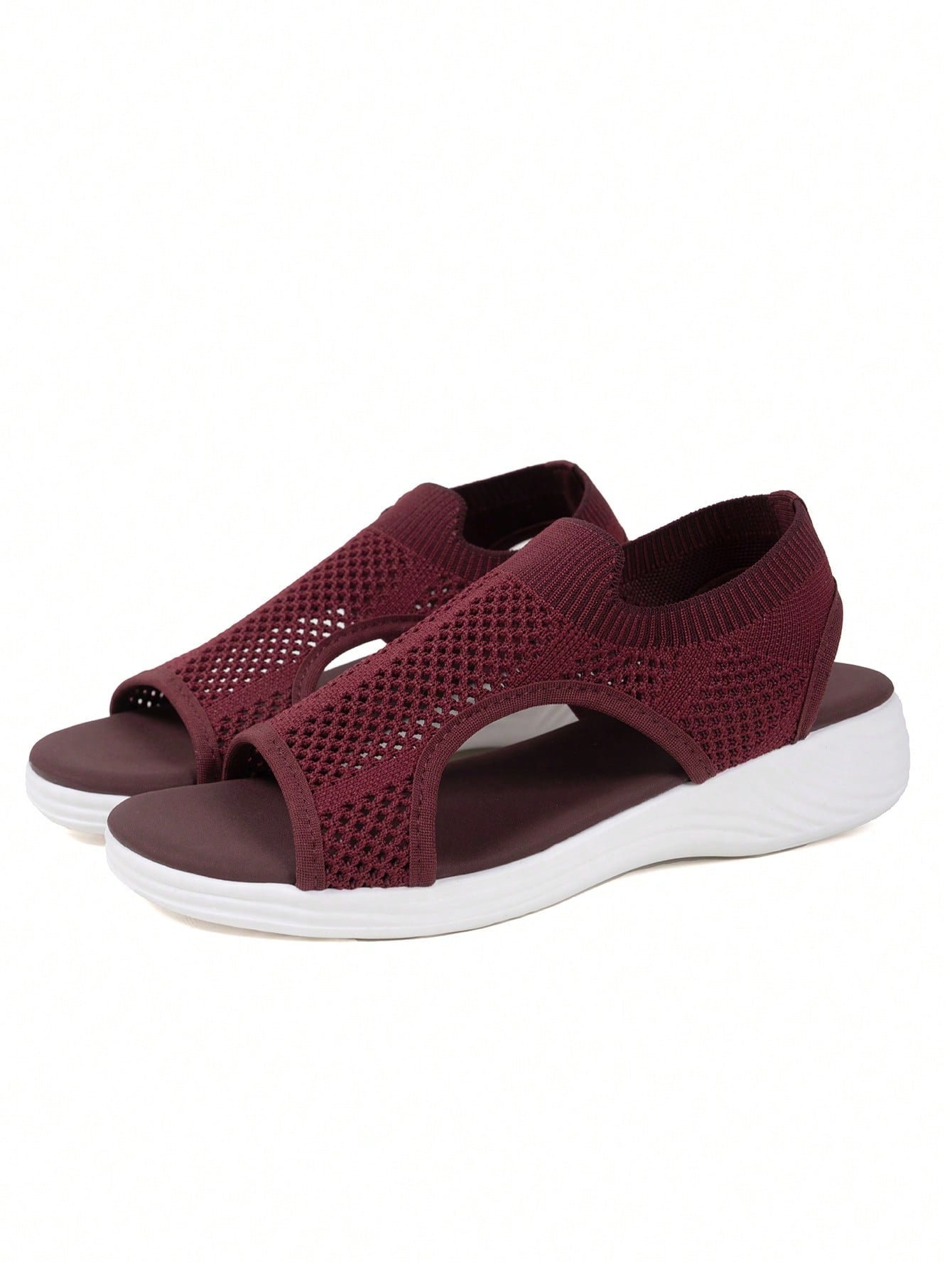 Plus size women's slip-on wedge slide sandals with open toe, low platform heel, and breathable cutout fabric upper, shown as a casual outdoor style sandal.