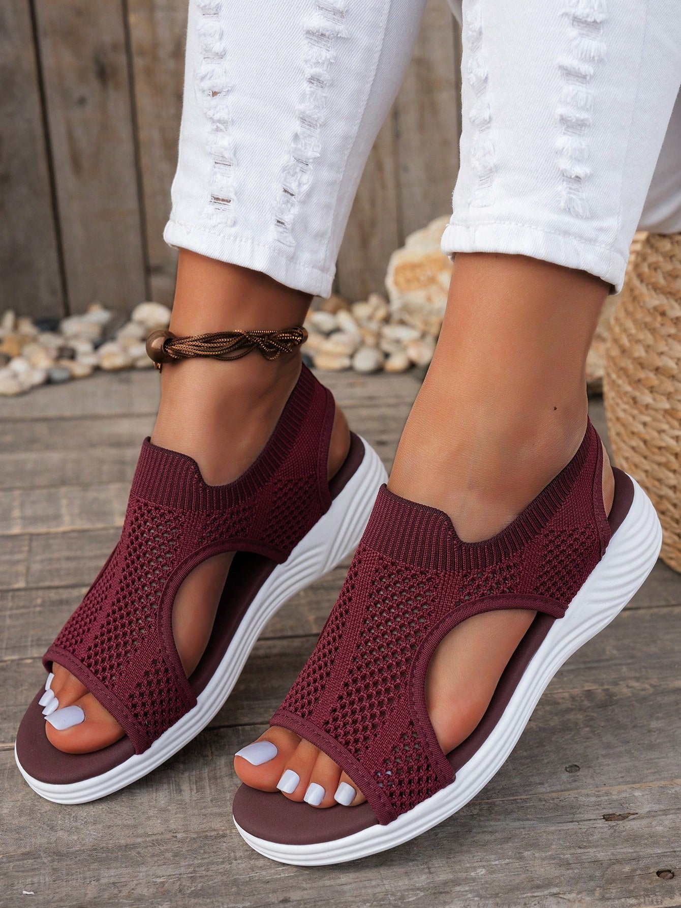 Plus size women's slip-on wedge slide sandals with open toe, low platform heel, and breathable cutout fabric upper, shown as a casual outdoor style sandal.