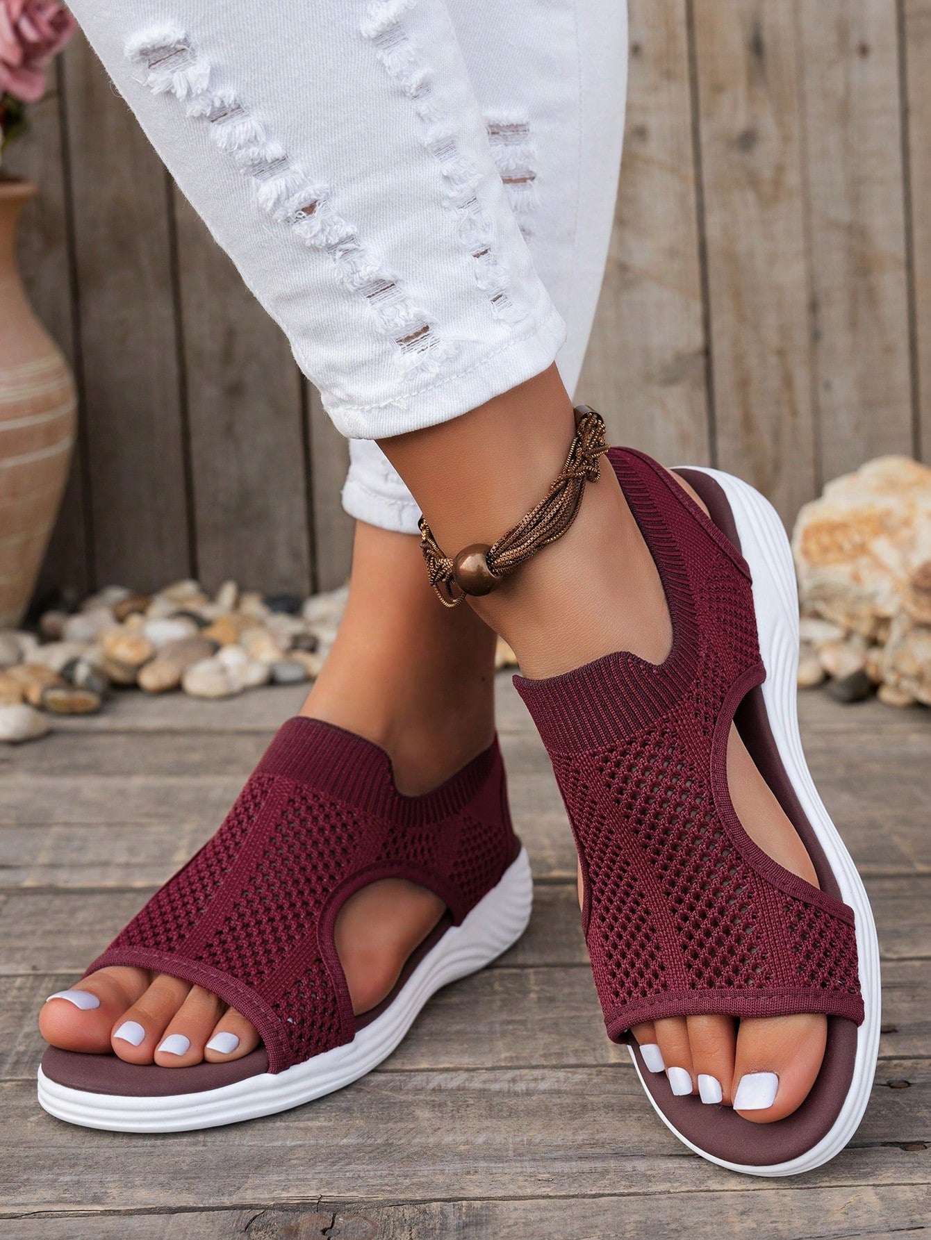 Plus size women's slip-on wedge slide sandals with open toe, low platform heel, and breathable cutout fabric upper, shown as a casual outdoor style sandal.