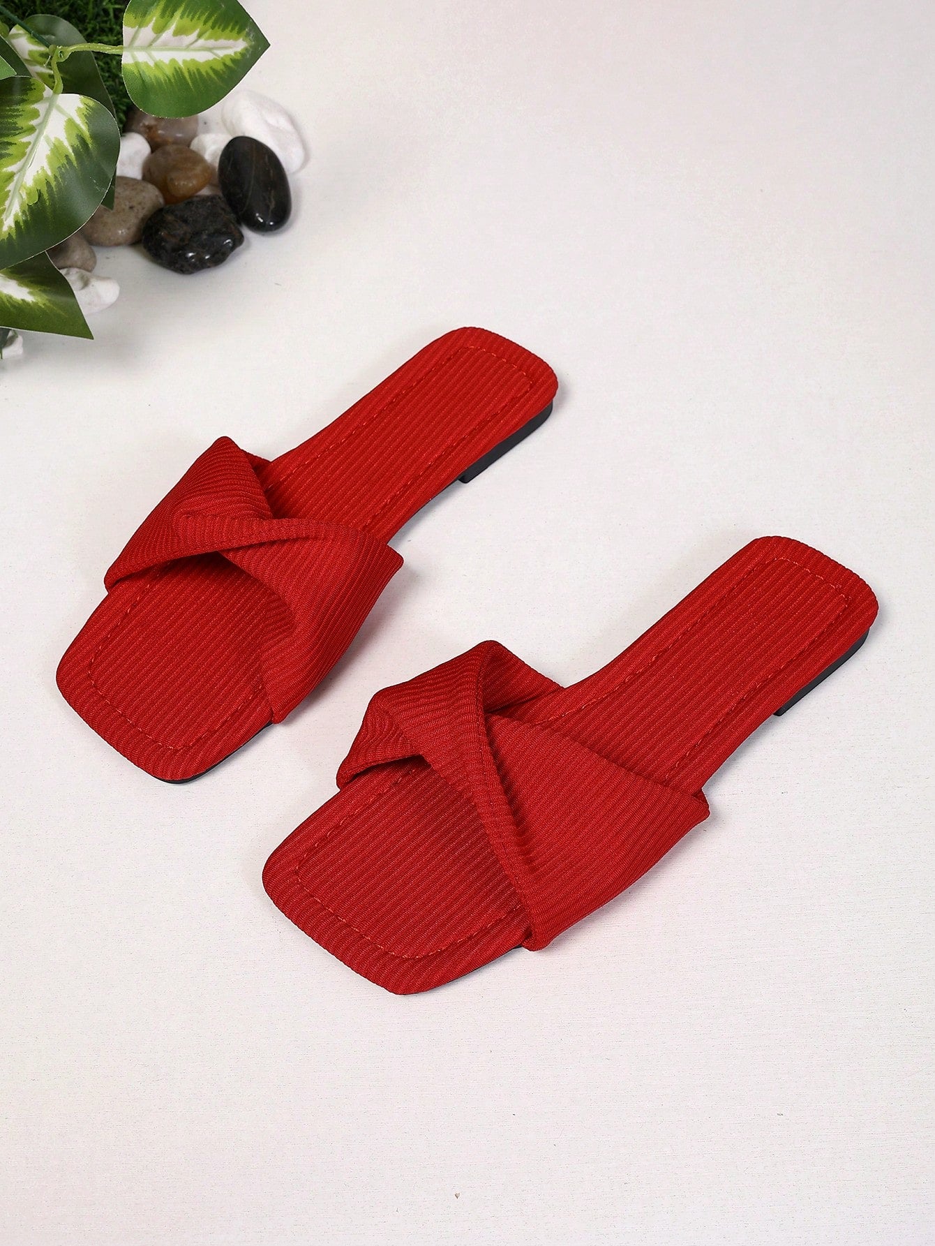 Women's white flat thong slide sandals with open square toe and twist detail, casual elegant style for home wear.