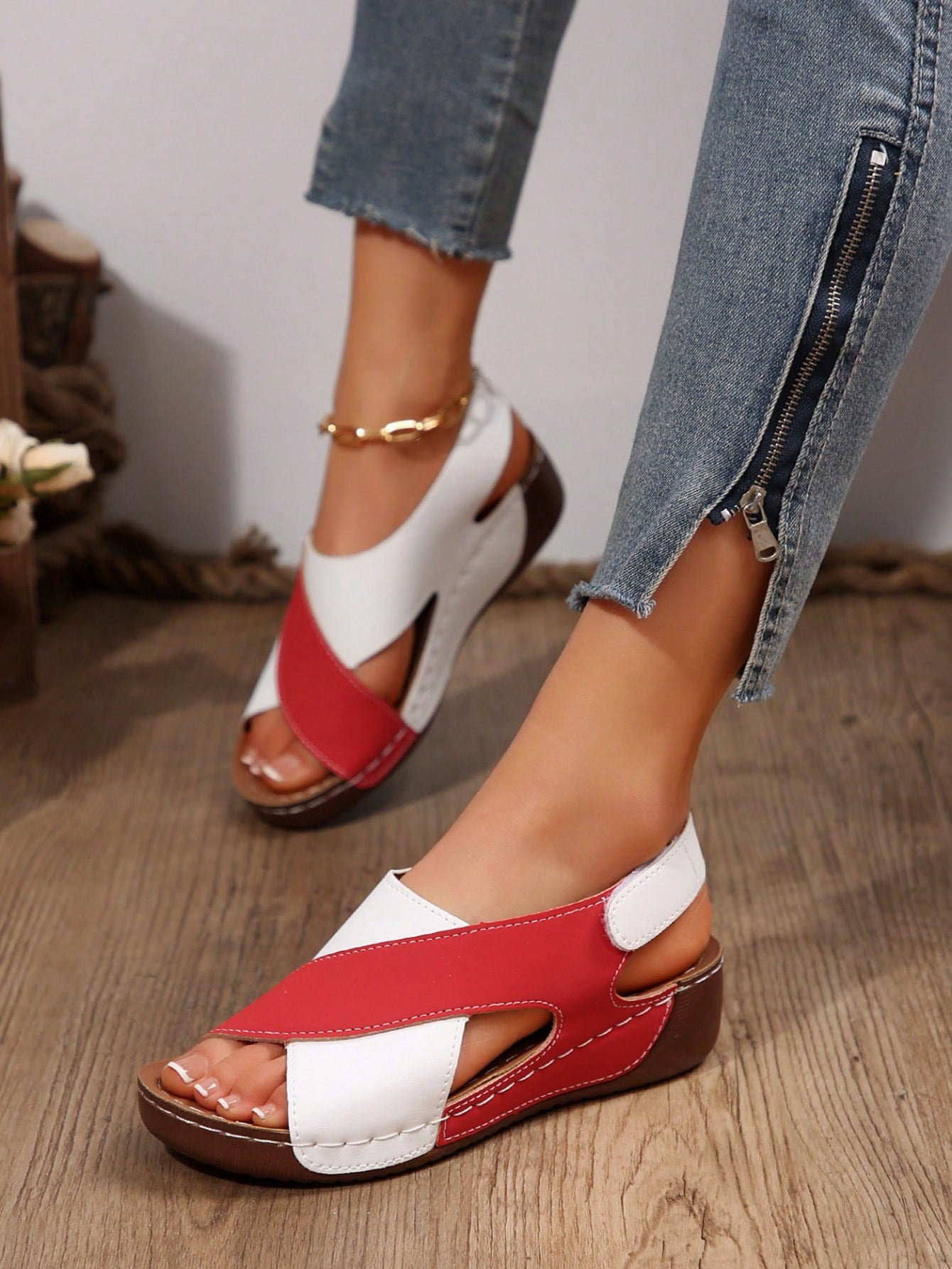Women's color block platform flat sandals with open toe, criss-cross straps, and hook-loop closure, featuring a low heel thick sole design for casual vacation wear.