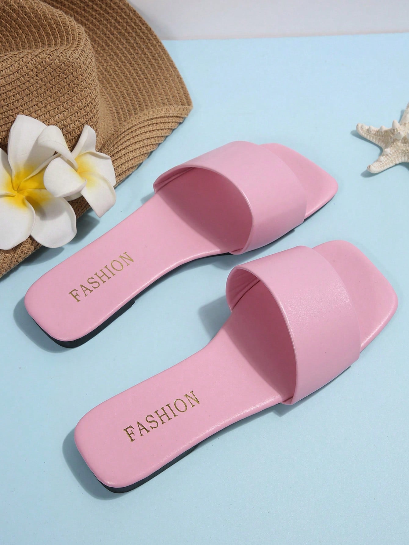 Women's flat slide sandals with a minimalist strap design, square open toe, and slip-on style for casual indoor and outdoor wear.