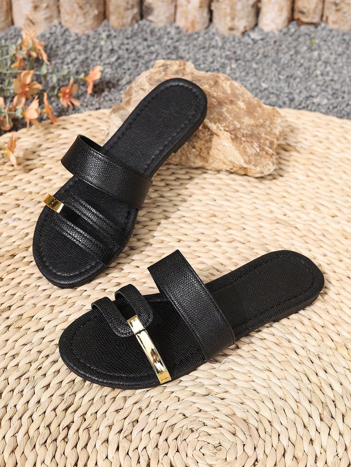 Women's yellow open-toe flat slide sandals featuring a cut-out design and textured plain pattern for casual beach and daily wear.