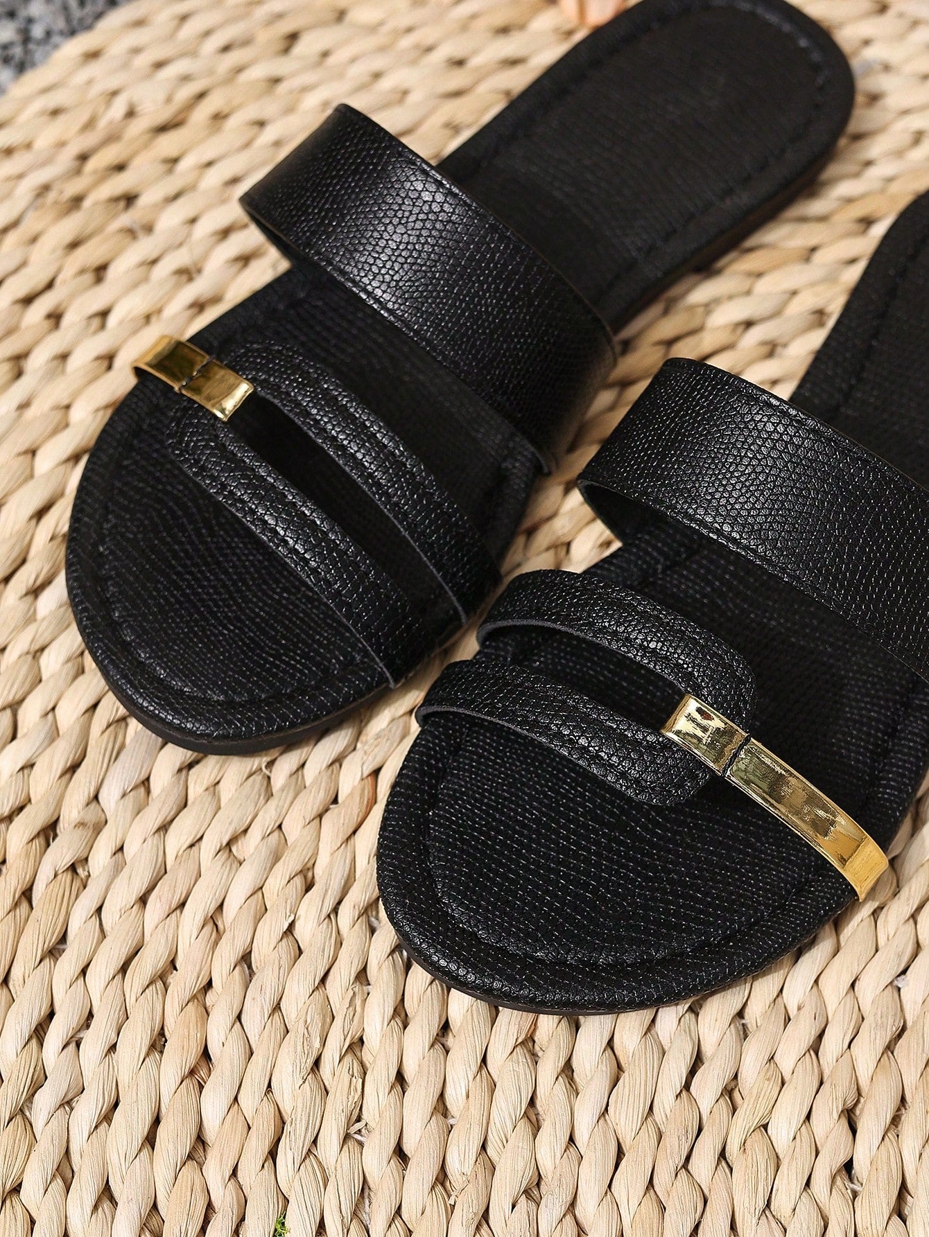 Women's yellow open-toe flat slide sandals featuring a cut-out design and textured plain pattern for casual beach and daily wear.