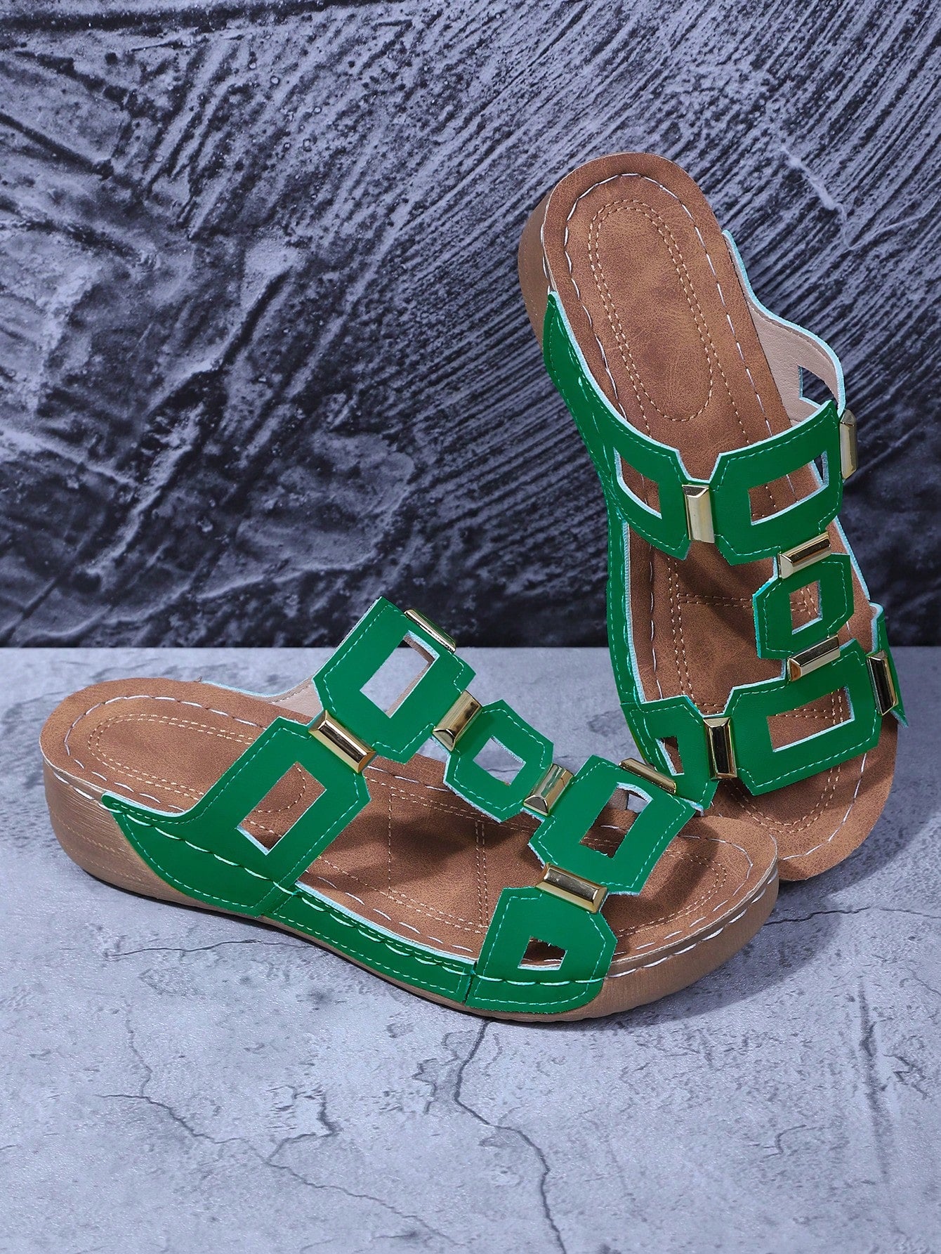 Women's open-toe wedge slide sandals with studded hollow-out upper, cross-over straps, buckle closure, and thick soft sole