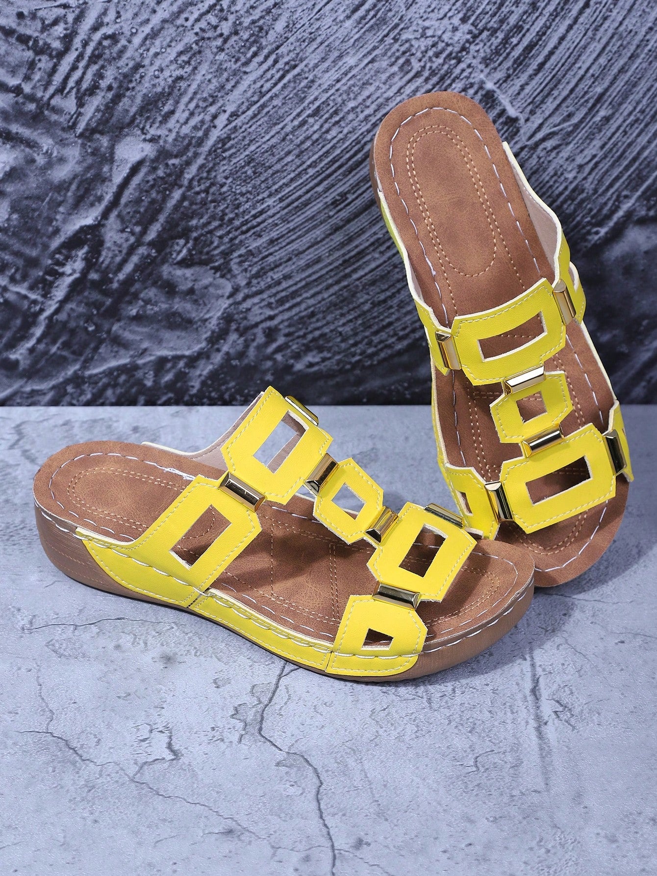 Women's open-toe wedge slide sandals with studded hollow-out upper, cross-over straps, buckle closure, and thick soft sole