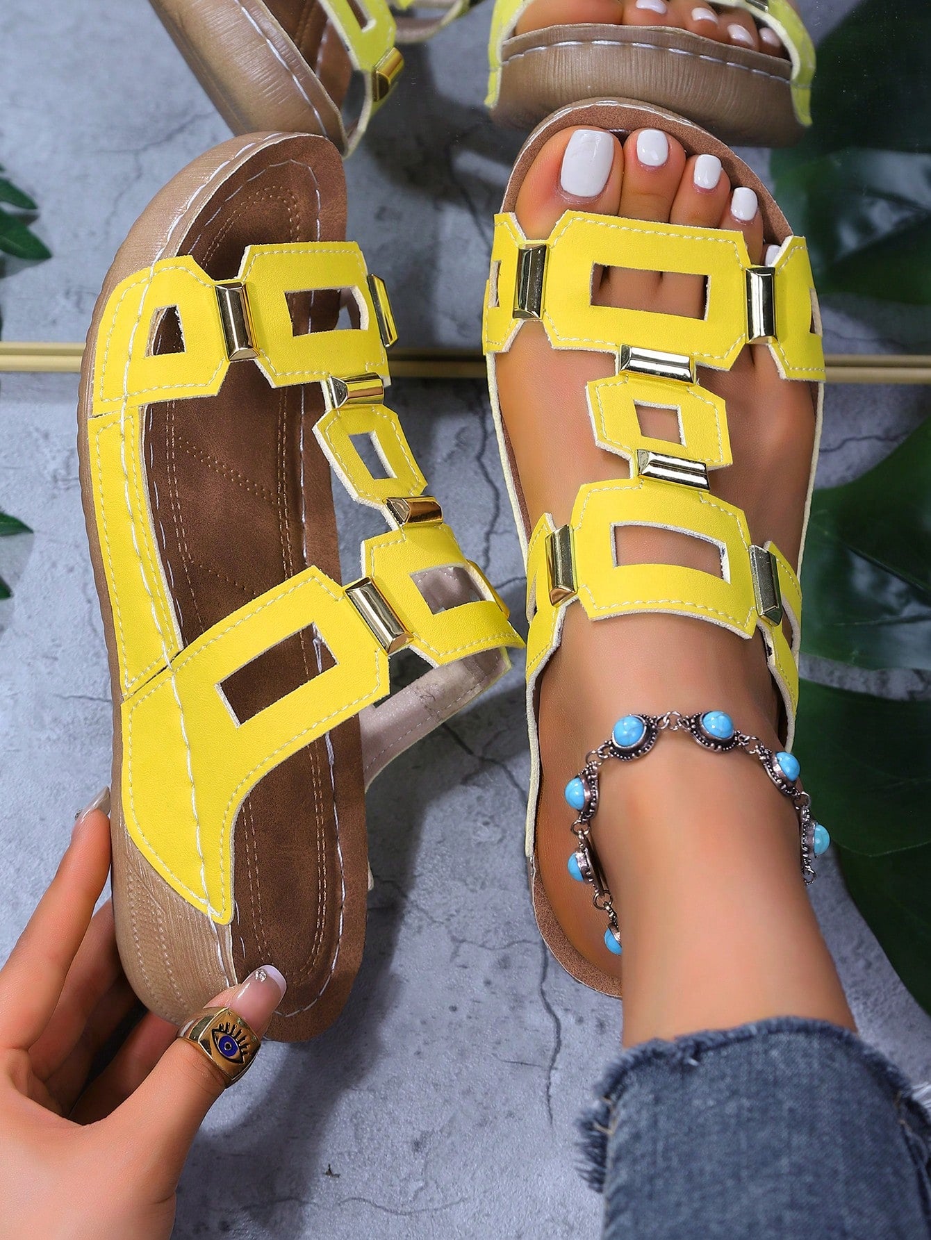 Women's open-toe wedge slide sandals with studded hollow-out upper, cross-over straps, buckle closure, and thick soft sole