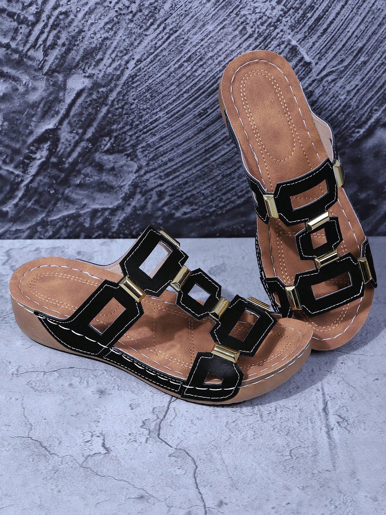 Women's open-toe wedge slide sandals with studded hollow-out upper, cross-over straps, buckle closure, and thick soft sole