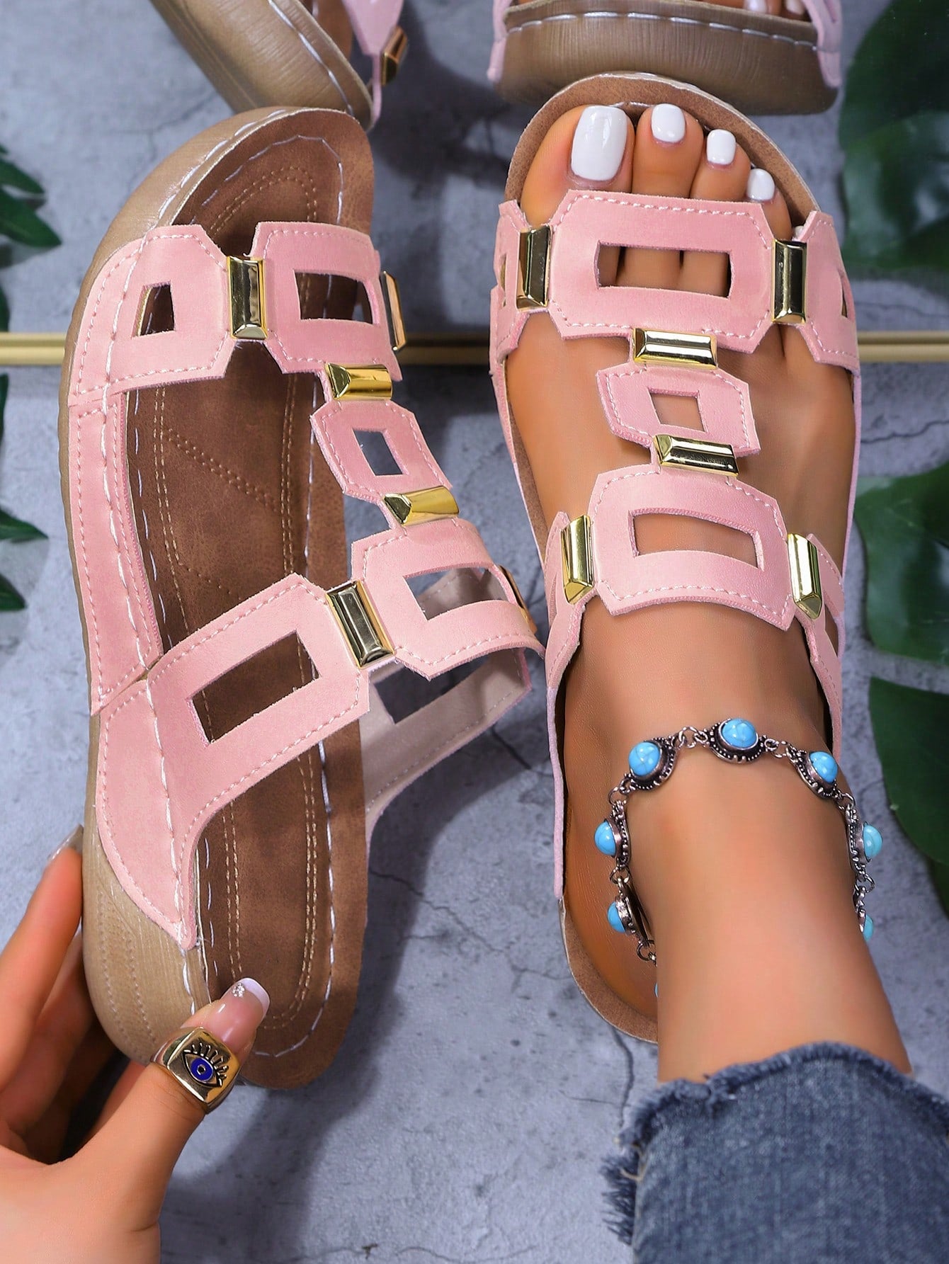 Women's open-toe wedge slide sandals with studded hollow-out upper, cross-over straps, buckle closure, and thick soft sole