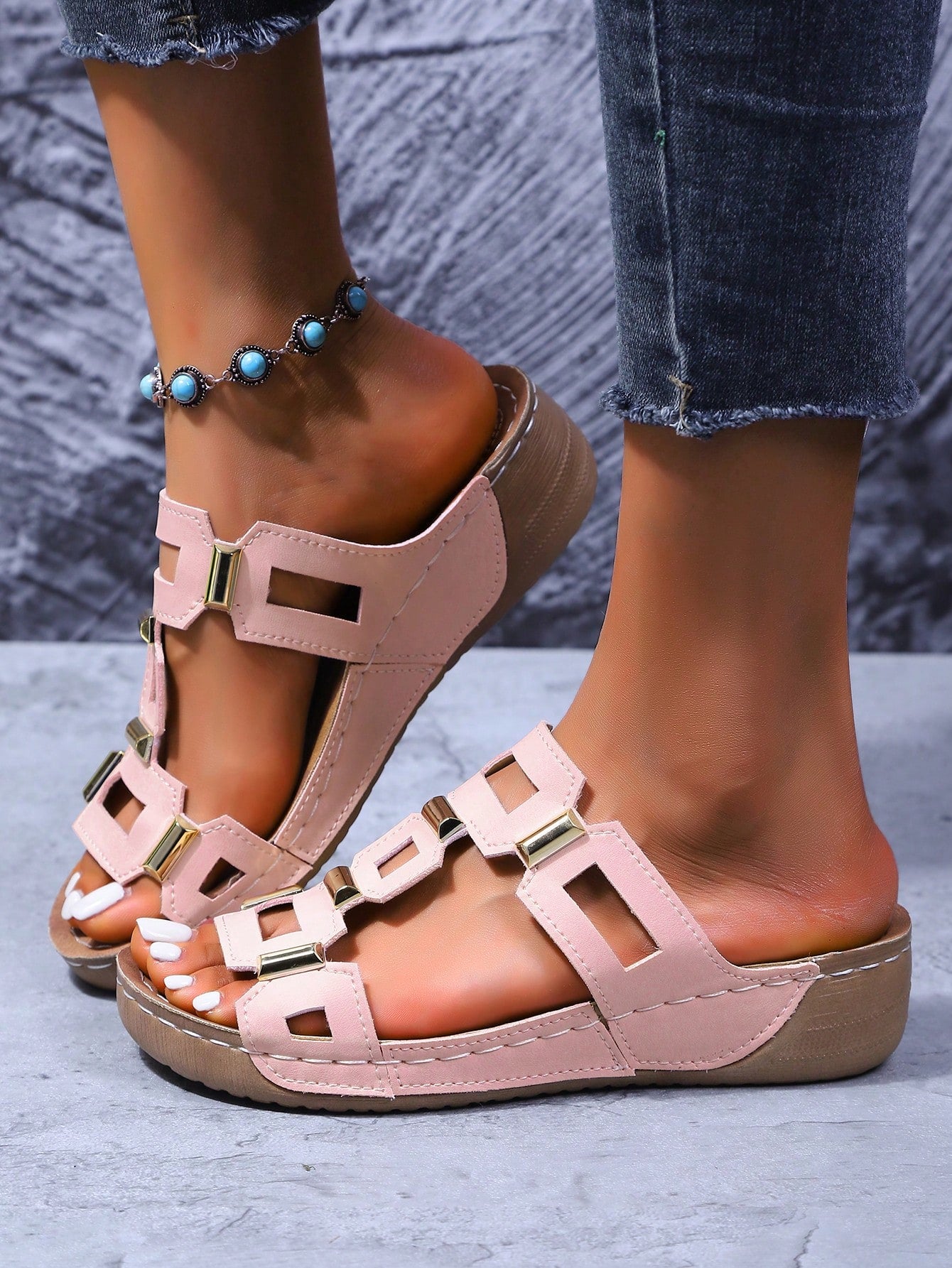 Women's open-toe wedge slide sandals with studded hollow-out upper, cross-over straps, buckle closure, and thick soft sole