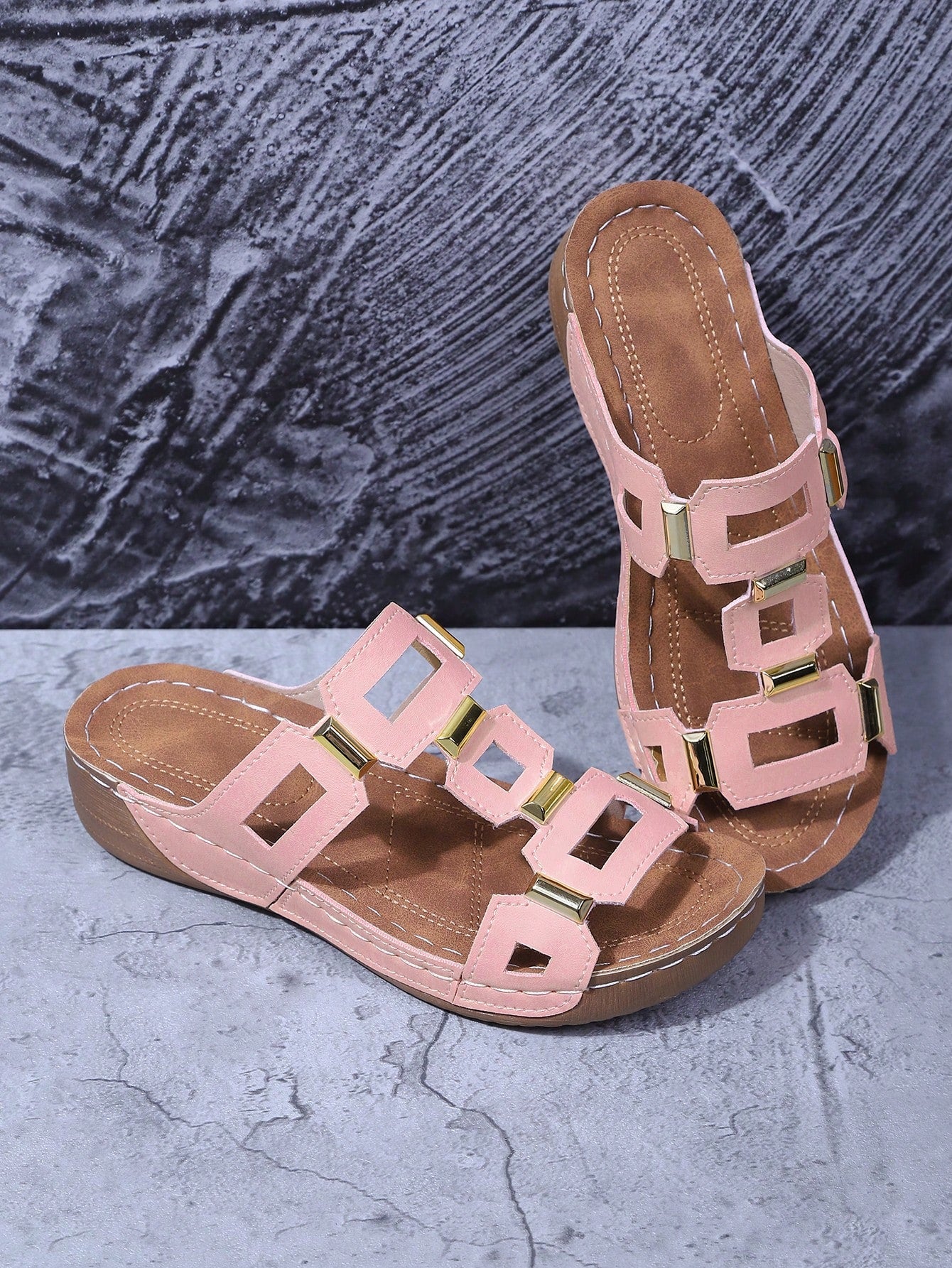 Women's open-toe wedge slide sandals with studded hollow-out upper, cross-over straps, buckle closure, and thick soft sole