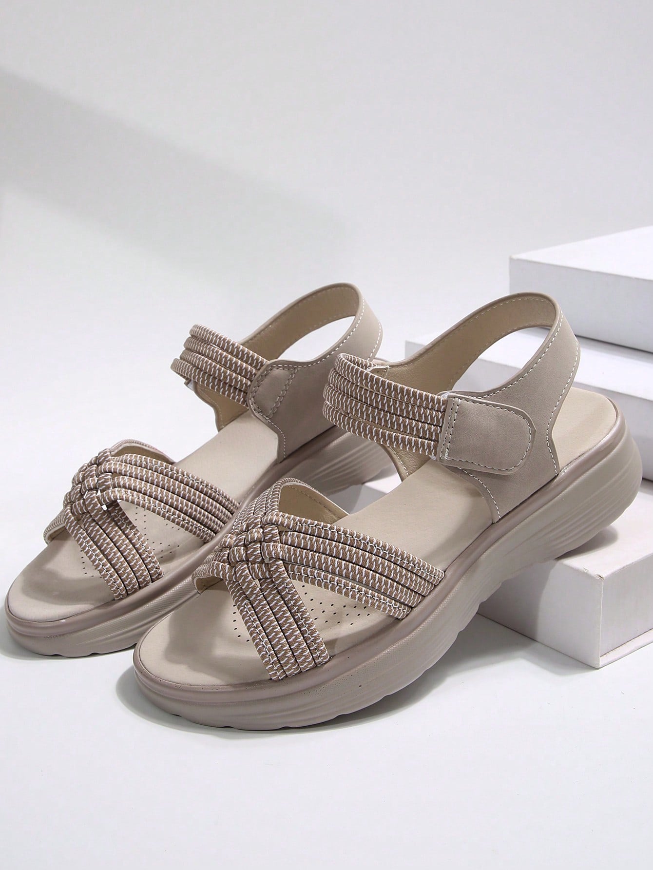Women's plus size platform wedge sandals with hook-and-loop closure, open toe, ankle strap, and cut-out detailing in a casual beach style.