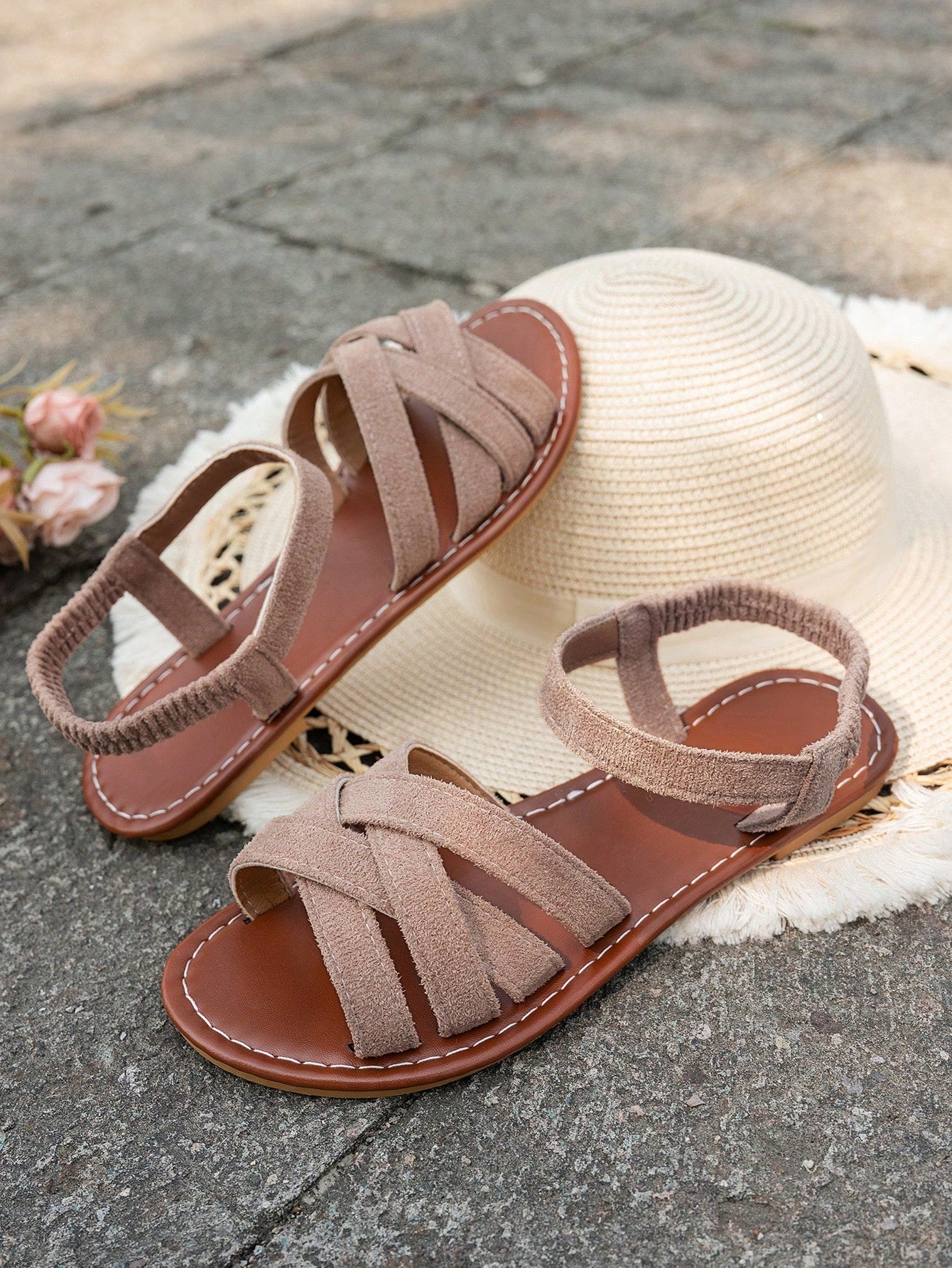 Women's flat thick sole gladiator sandals with cross adjustable straps and open toe, suitable for casual, vacation, and beach wear.
