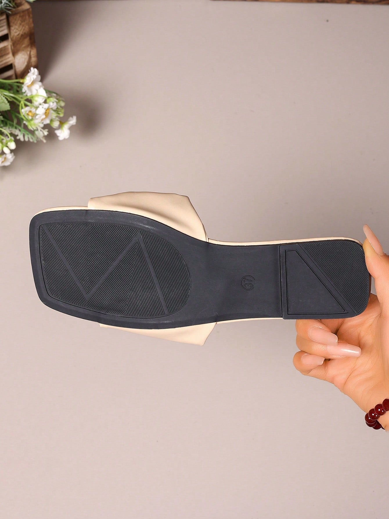 Women's white flat thong slide sandals with open square toe and twist detail, casual elegant style for home wear.