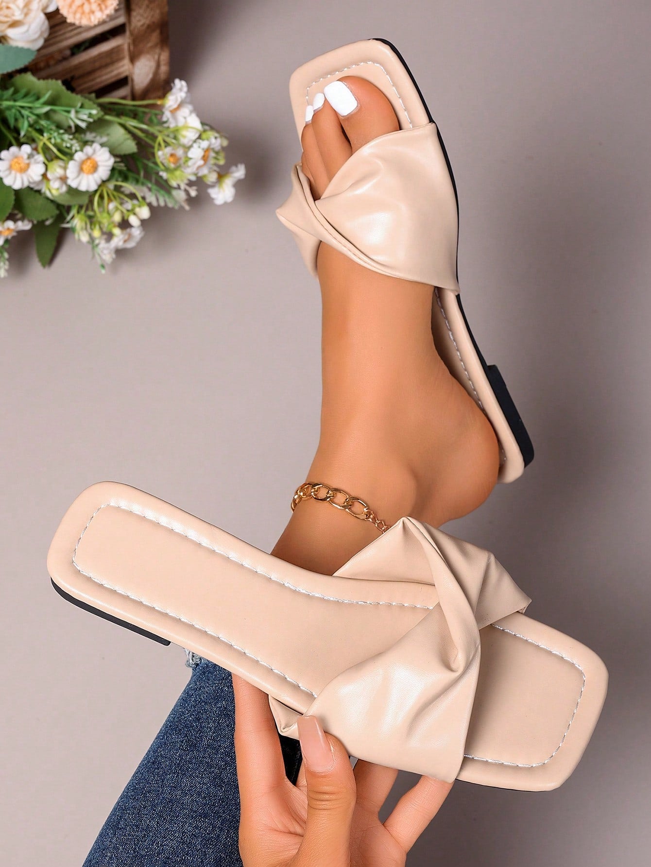 Women's white flat thong slide sandals with open square toe and twist detail, casual elegant style for home wear.