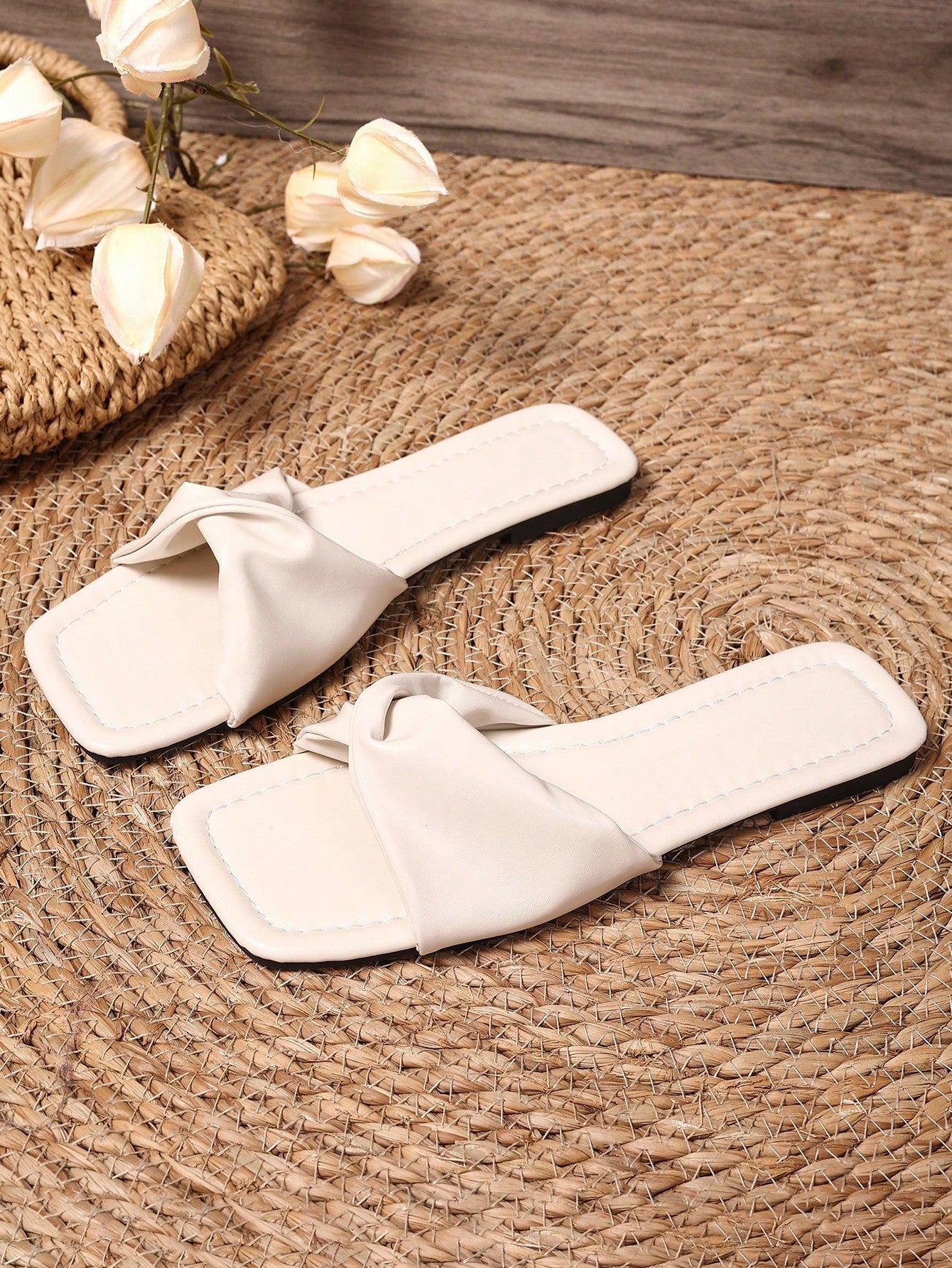 Women's white flat thong slide sandals with open square toe and twist detail, casual elegant style for home wear.