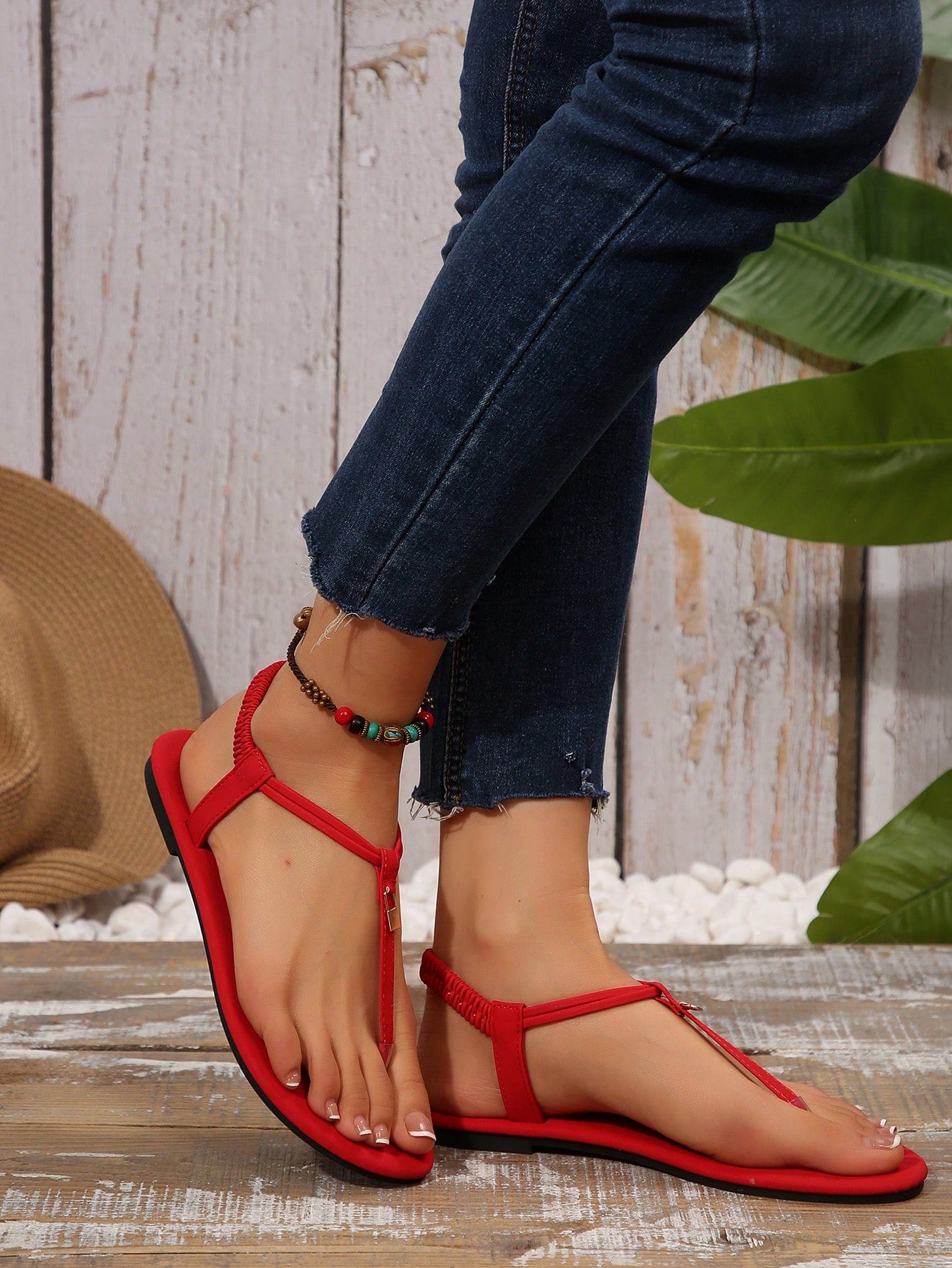 Women’s Roman style strap slide sandals with flat sole, buckle detail, and round toe, designed as casual slip-on beach and outdoor sandals.