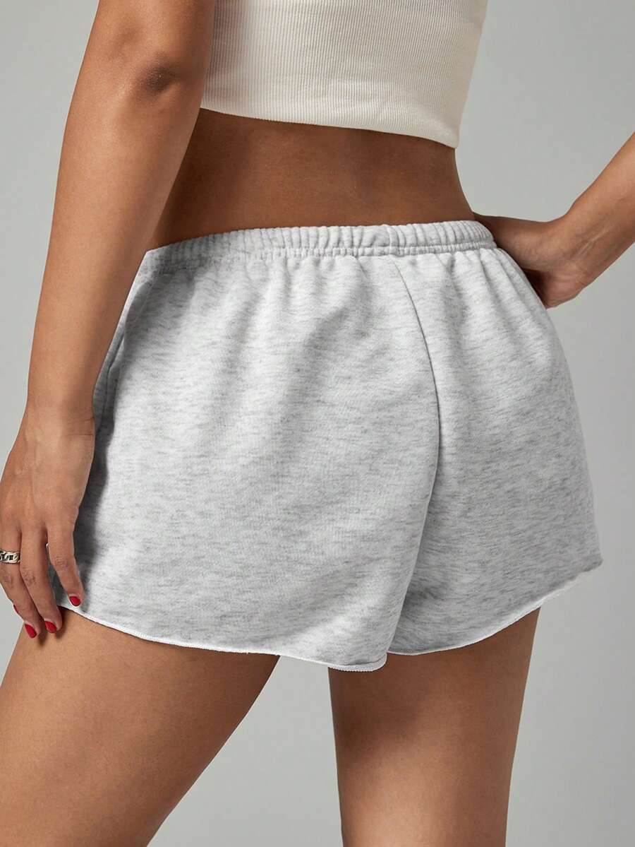Petite women's burgundy casual track shorts with drawstring waist, raw hem, loose fit, and mini length