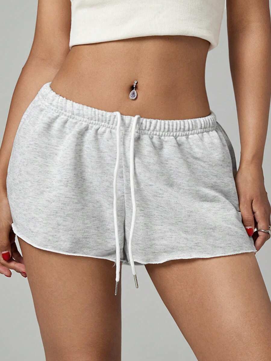Petite women's burgundy casual track shorts with drawstring waist, raw hem, loose fit, and mini length