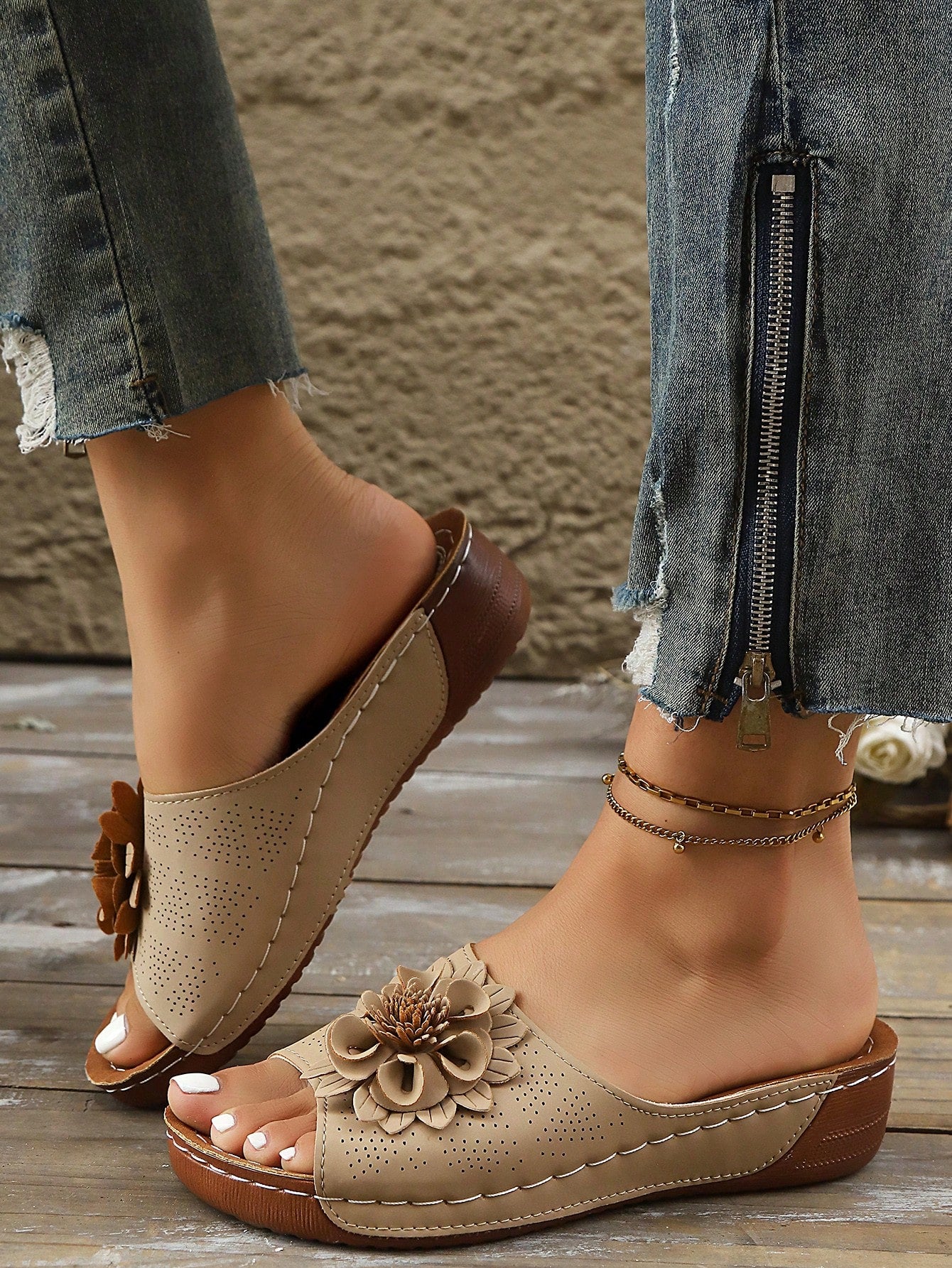 Women’s khaki platform wedge slide sandals with floral applique detail and open toe, slip-on beach style with thick sole.
