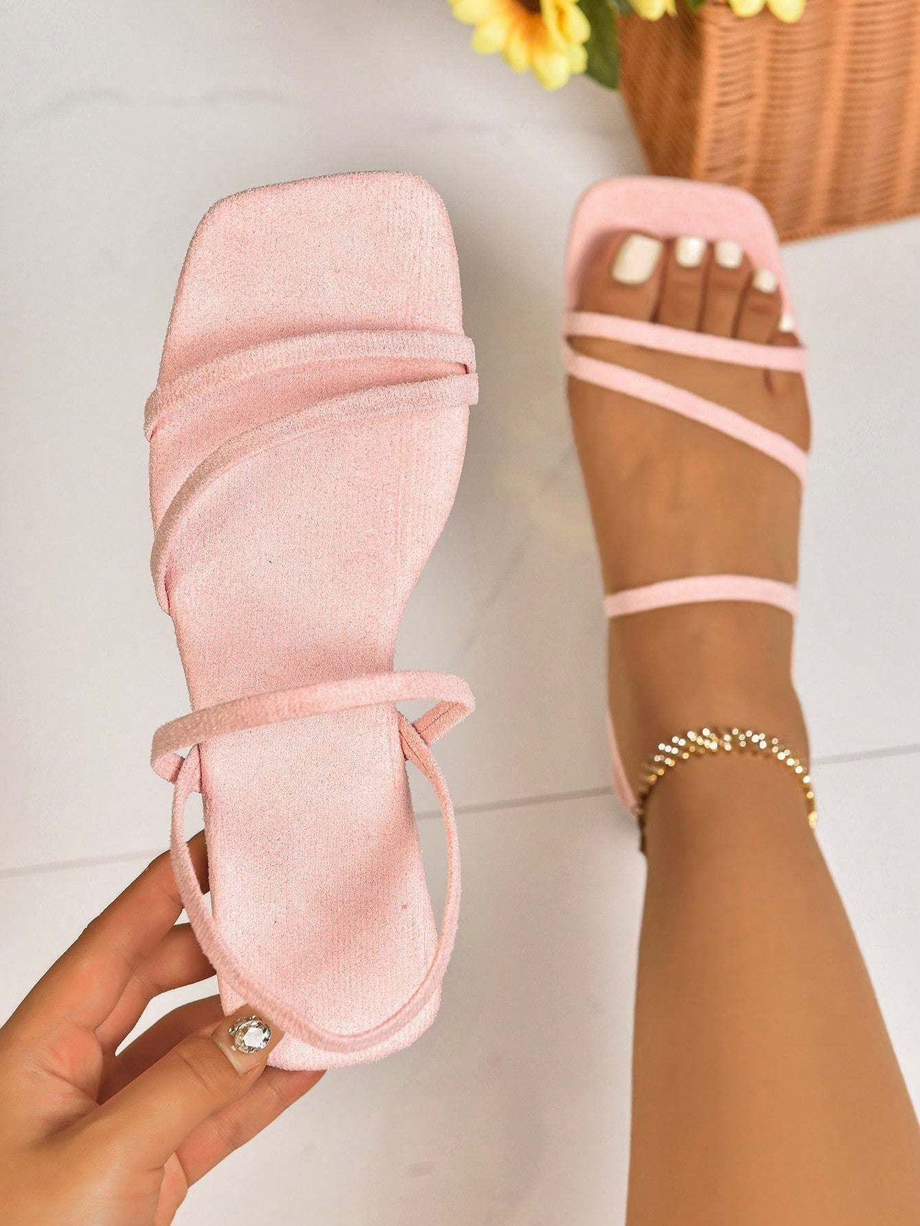 Women's flat sandals with a square open toe, crisscross front straps, and an elastic ankle strap, suitable for casual summer outdoor and beach vacation wear.