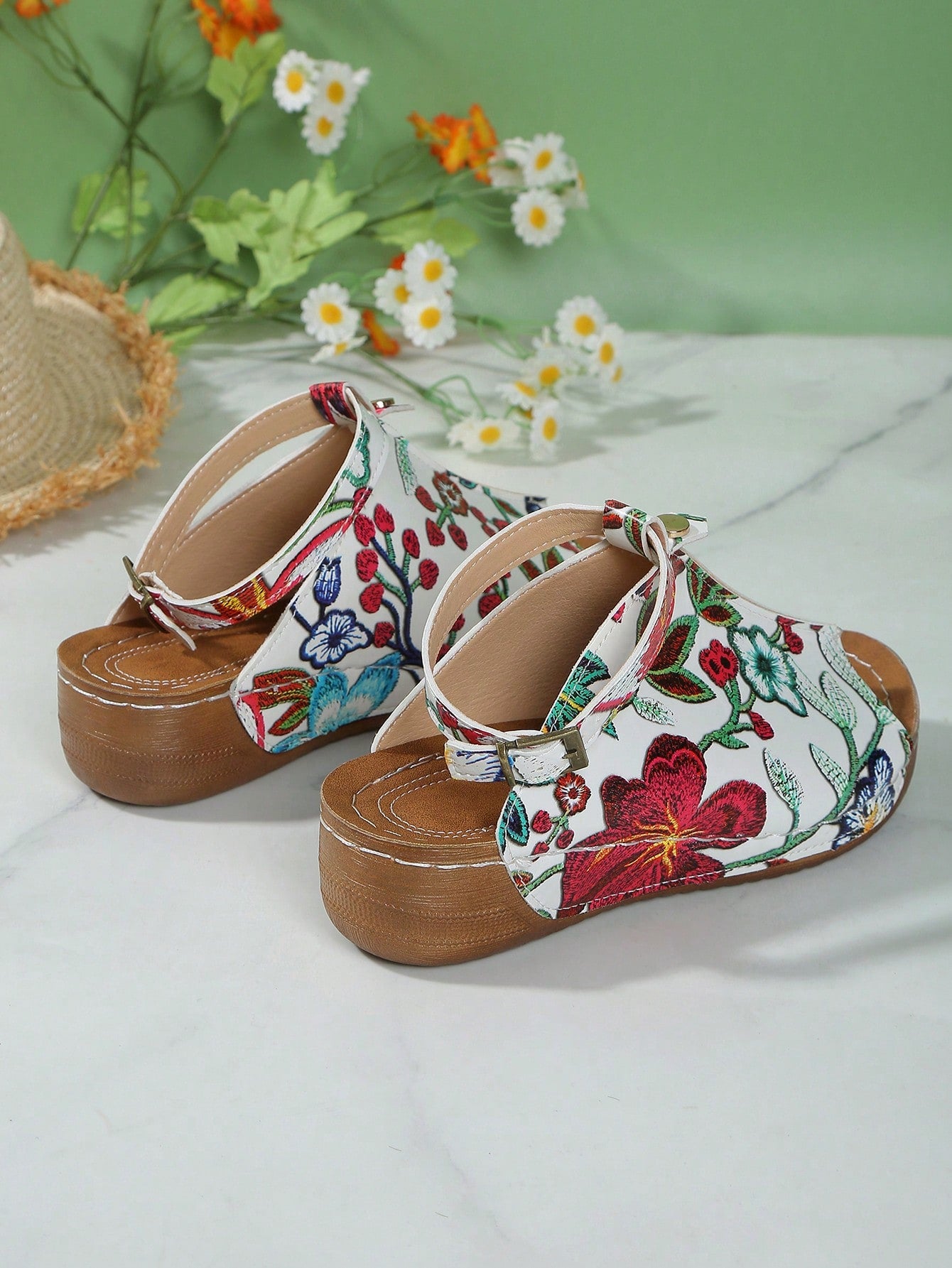 Women's open-toe platform wedge beach sandals with thick sole, stitching detail, floral accents, buckle closure, and removable adjustable shoelaces.