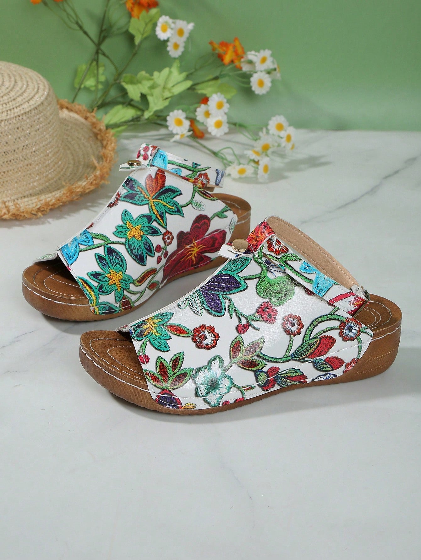 Women's open-toe platform wedge beach sandals with thick sole, stitching detail, floral accents, buckle closure, and removable adjustable shoelaces.