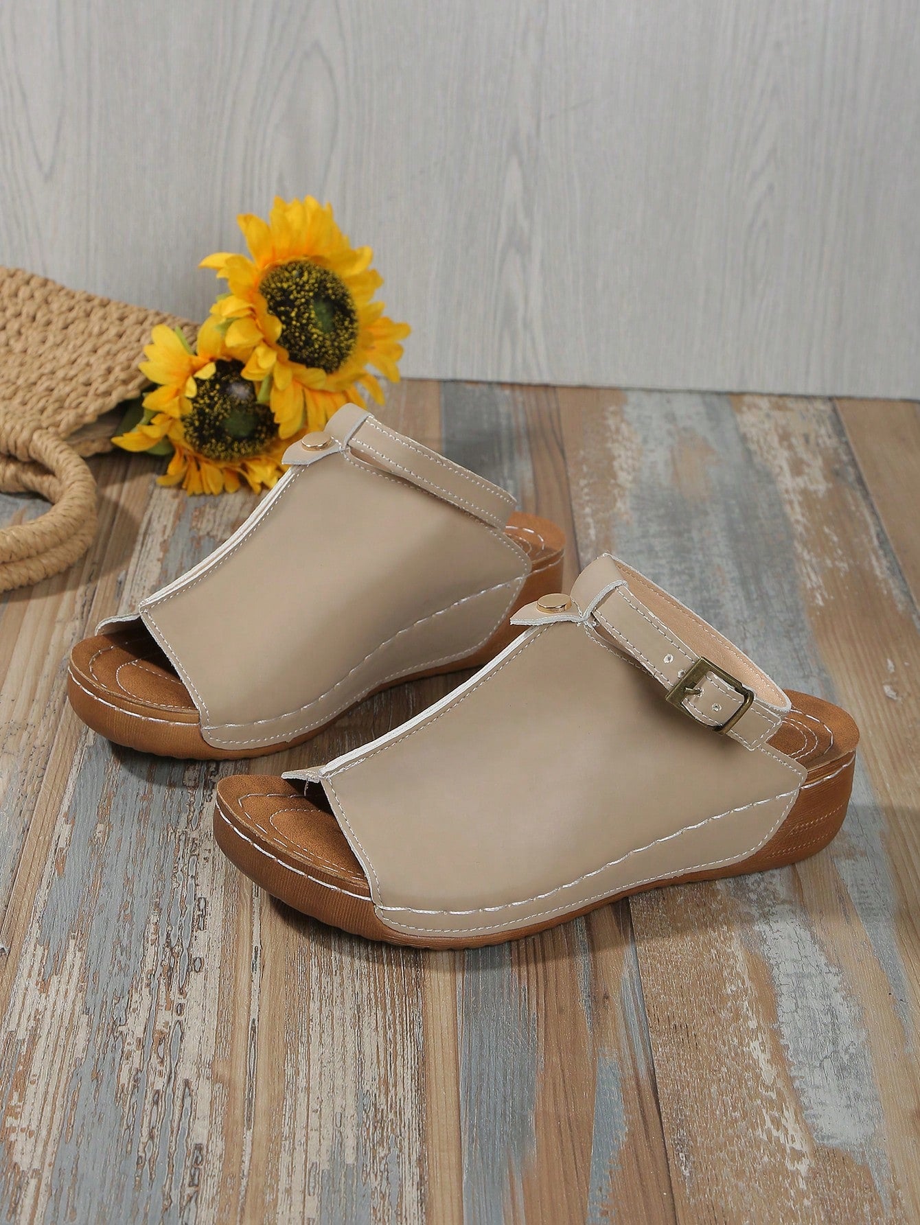 Women's open-toe platform wedge beach sandals with thick sole, stitching detail, floral accents, buckle closure, and removable adjustable shoelaces.