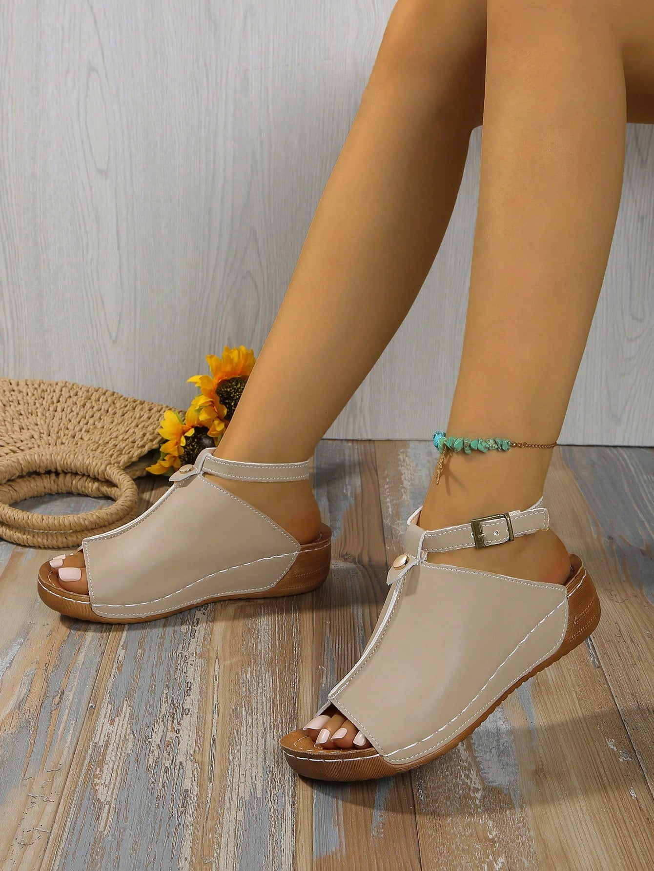 Women's open-toe platform wedge beach sandals with thick sole, stitching detail, floral accents, buckle closure, and removable adjustable shoelaces.