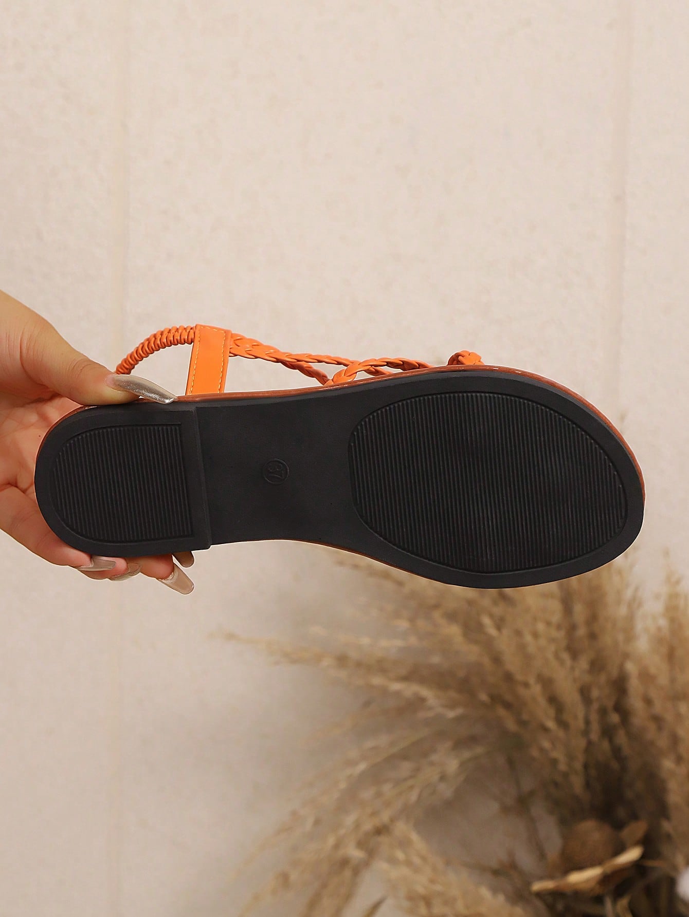 Open-toe flat slide sandals featuring rhinestone leaf decoration in a vacation-inspired style.