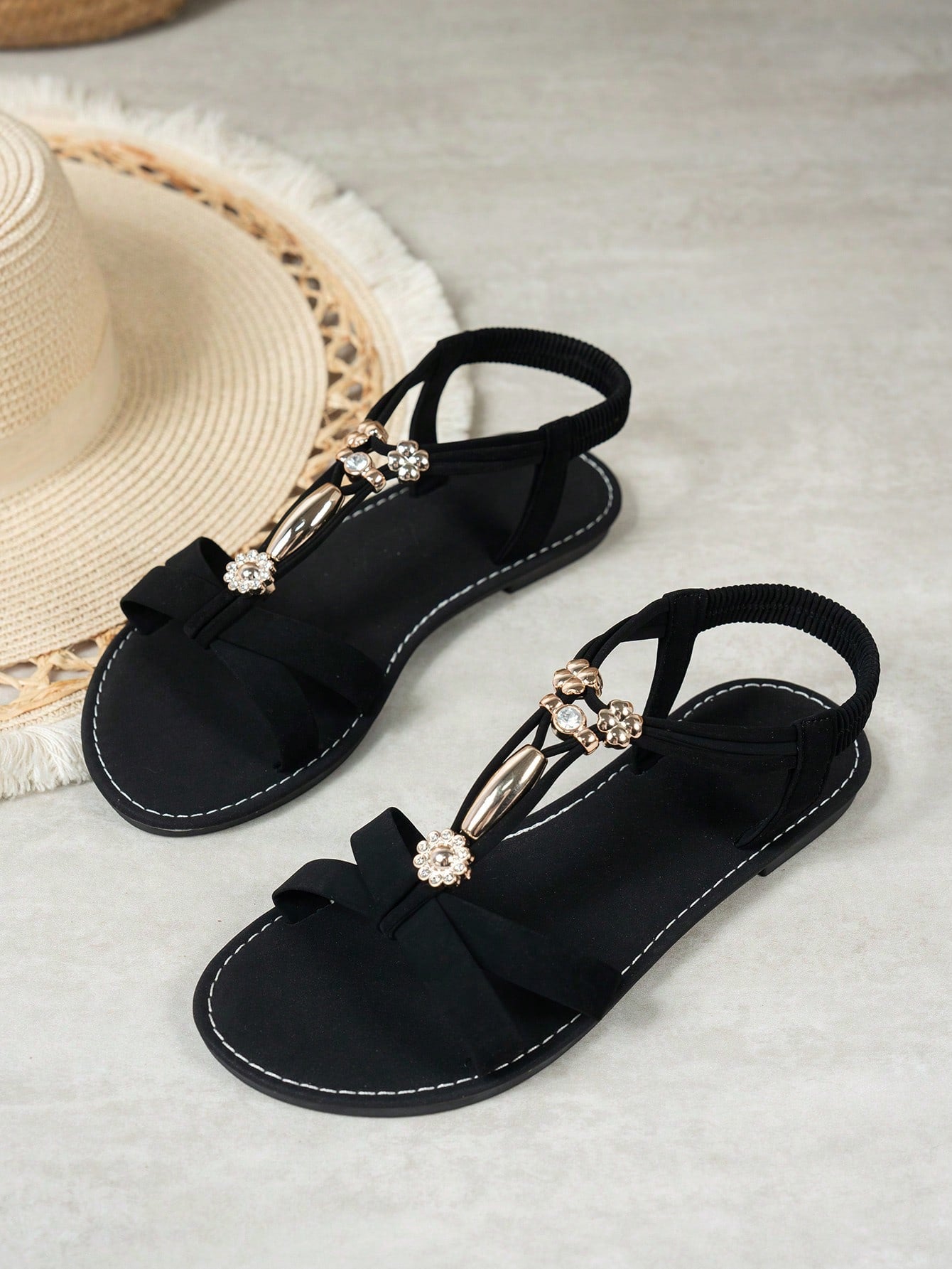Women's bohemian flat slingback sandals with beaded detailing and open-toe design, featuring a fabric upper, PU leather lining and insole, and TPR outsole.