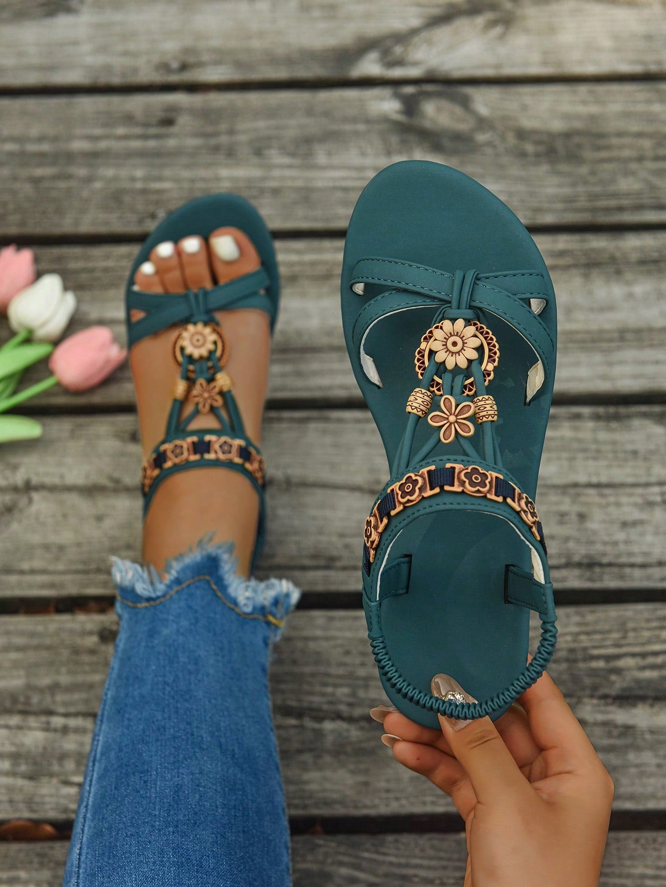 Women's flat slip-on sandals with open toe, plain solid-color look, beaded detail, and golden bar decor in a classic bohemian-inspired style.