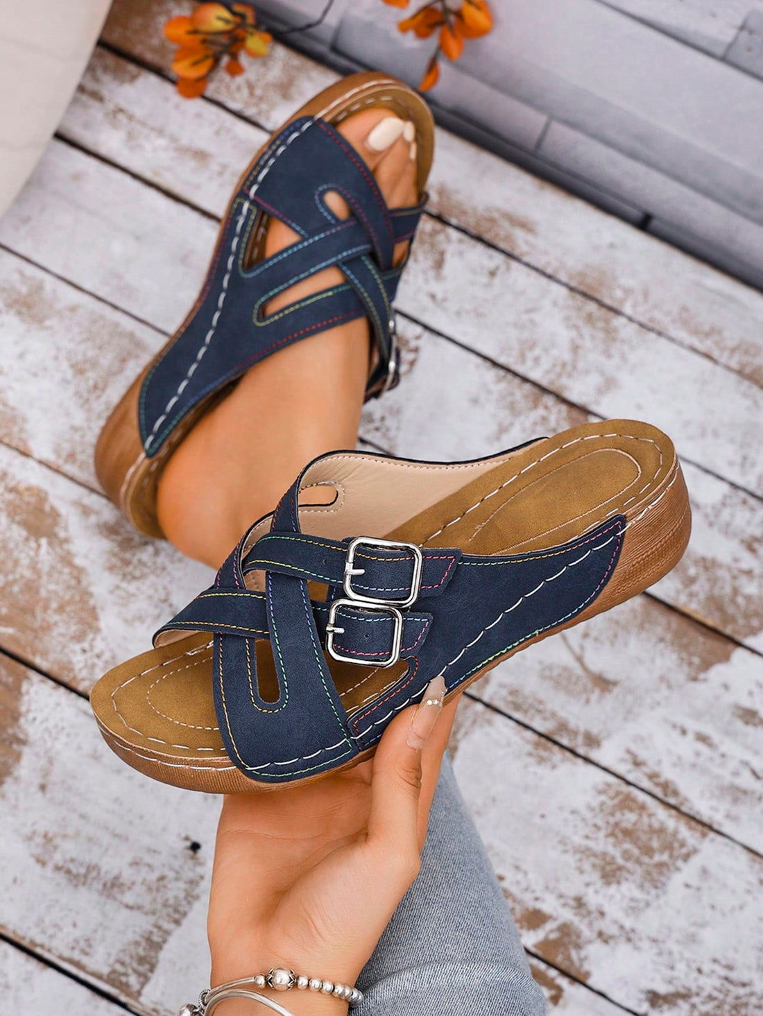 Women's slip-on beach wedge slide sandals with open toe, thick sole, criss-cross straps, and buckle detail