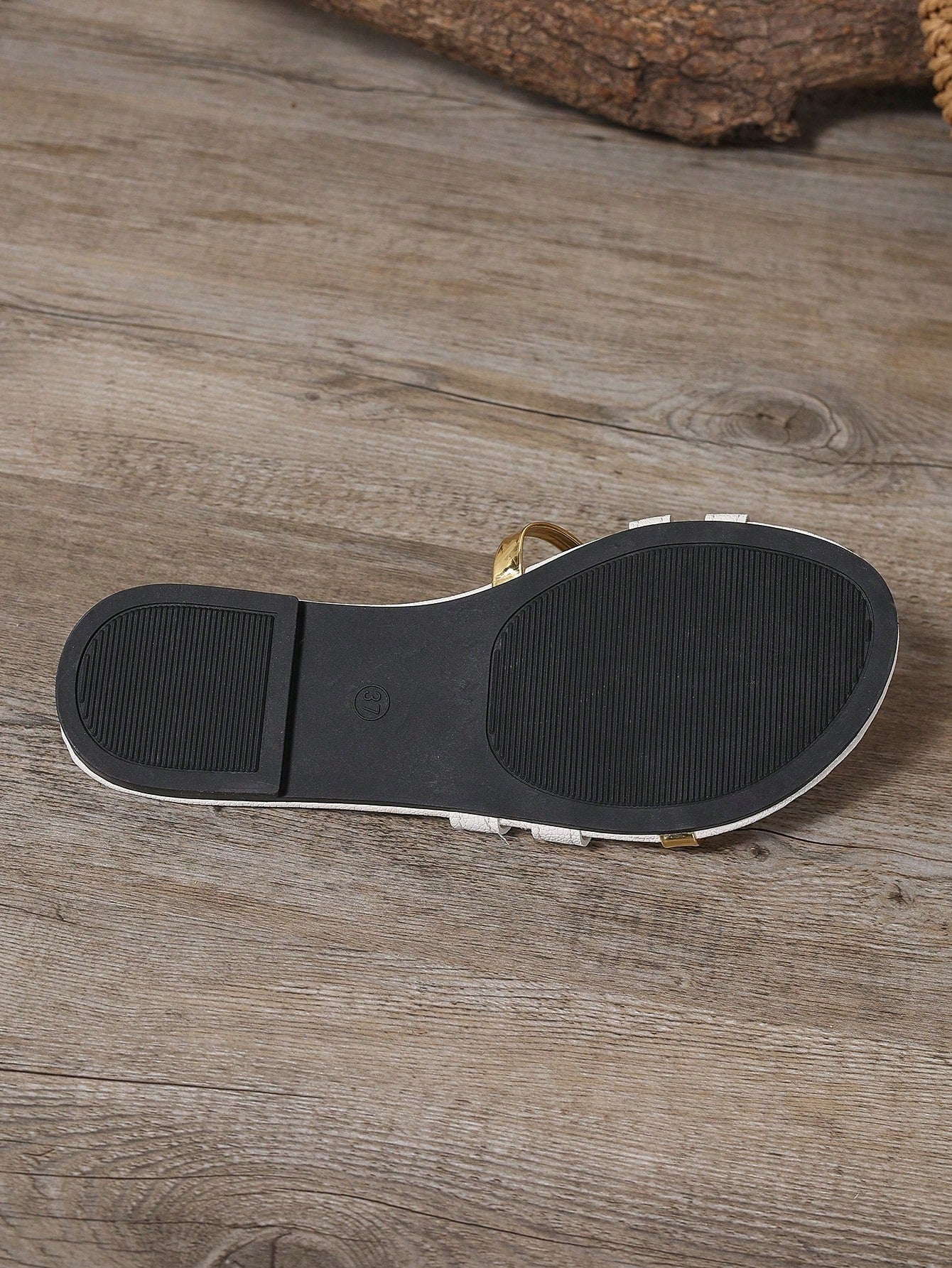 Women's yellow open-toe flat slide sandals featuring a cut-out design and textured plain pattern for casual beach and daily wear.