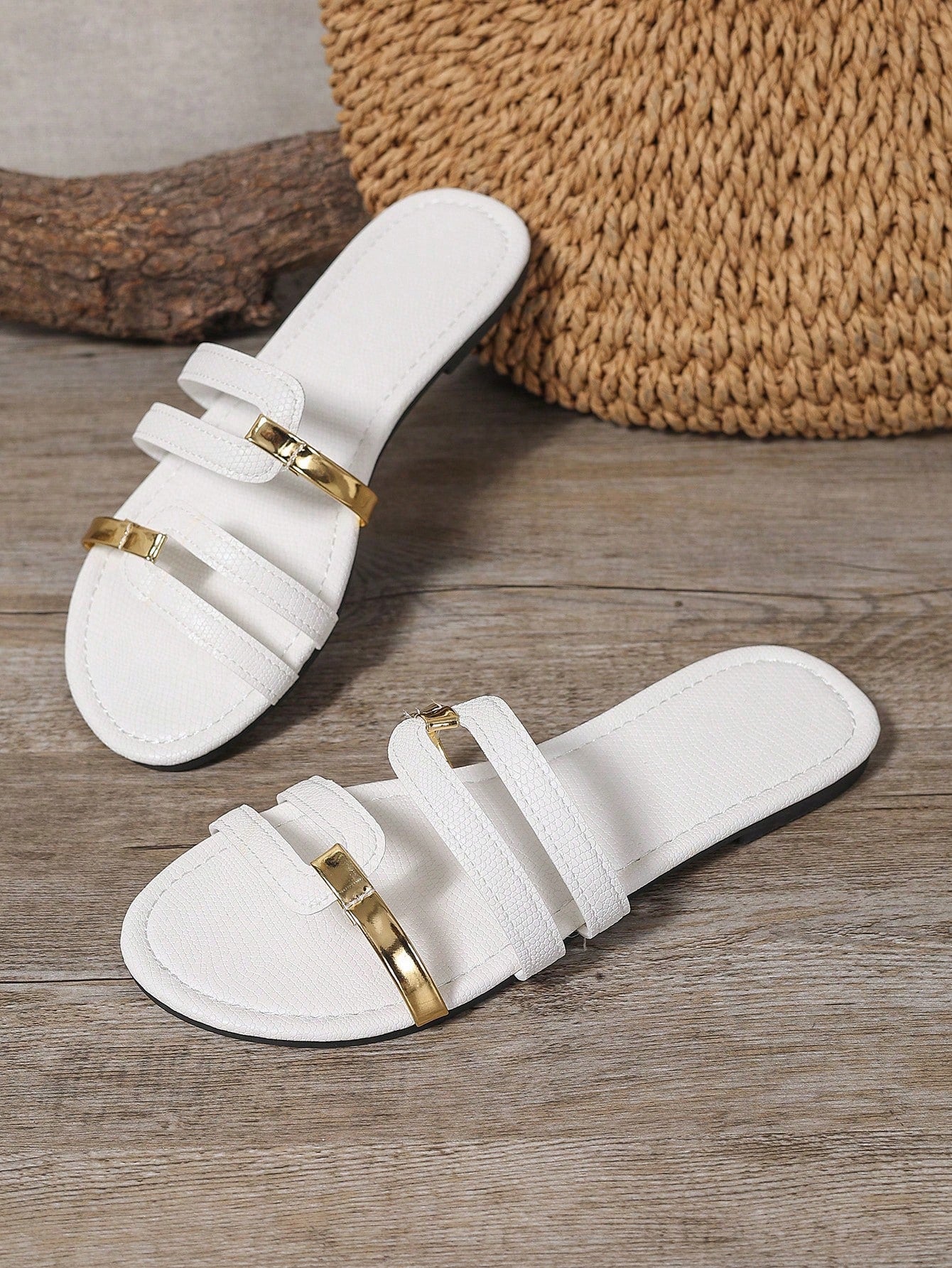 Women's yellow open-toe flat slide sandals featuring a cut-out design and textured plain pattern for casual beach and daily wear.