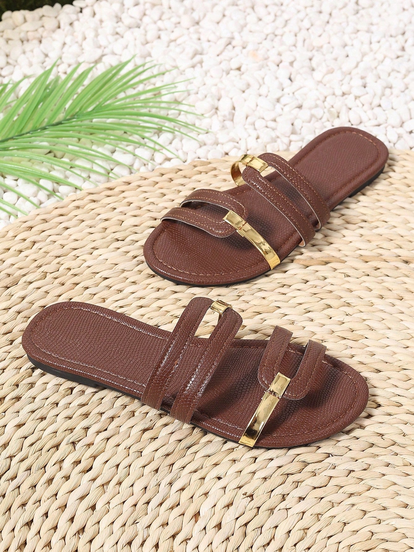 Women's yellow open-toe flat slide sandals featuring a cut-out design and textured plain pattern for casual beach and daily wear.