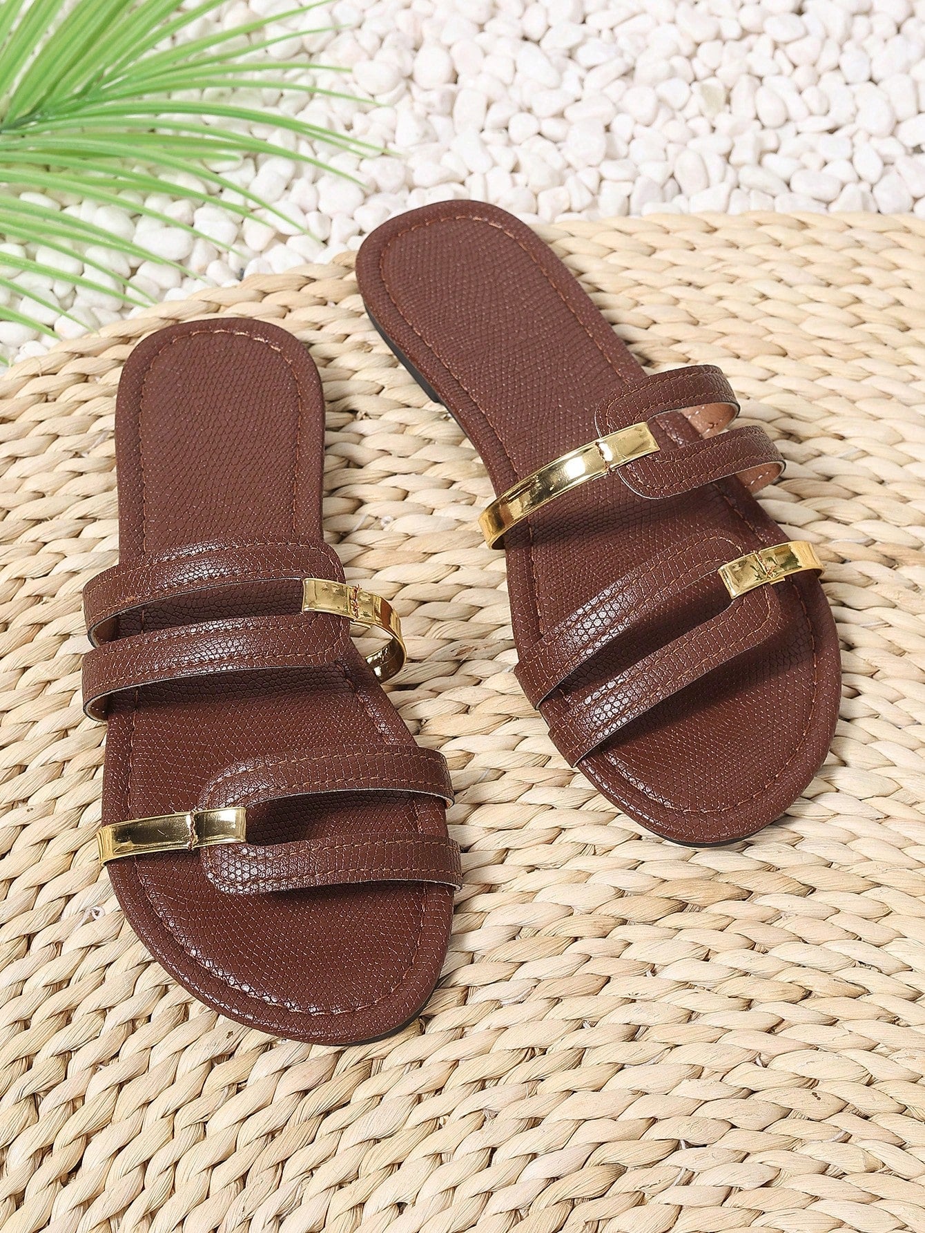 Women's yellow open-toe flat slide sandals featuring a cut-out design and textured plain pattern for casual beach and daily wear.