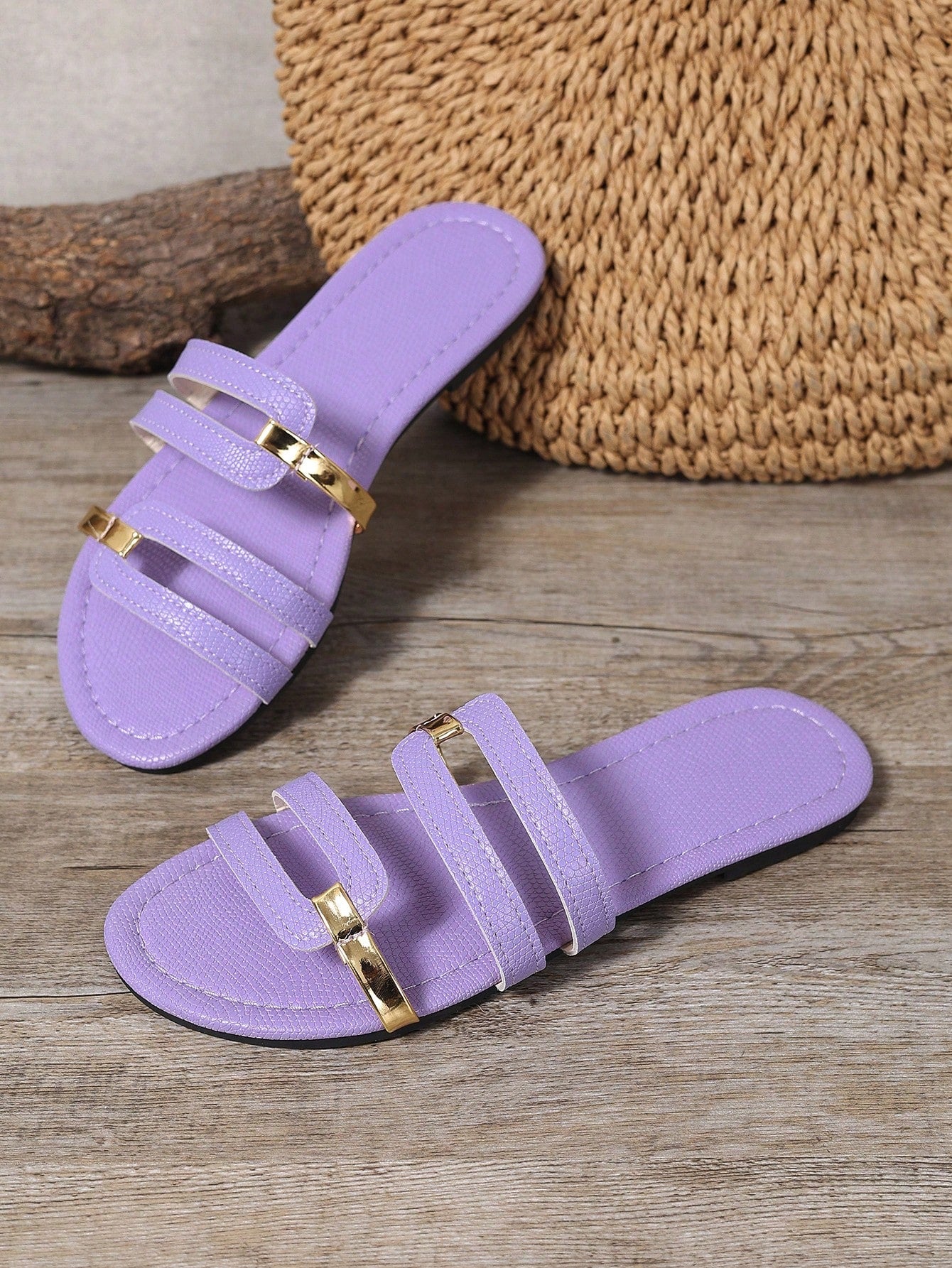 Women's yellow open-toe flat slide sandals featuring a cut-out design and textured plain pattern for casual beach and daily wear.