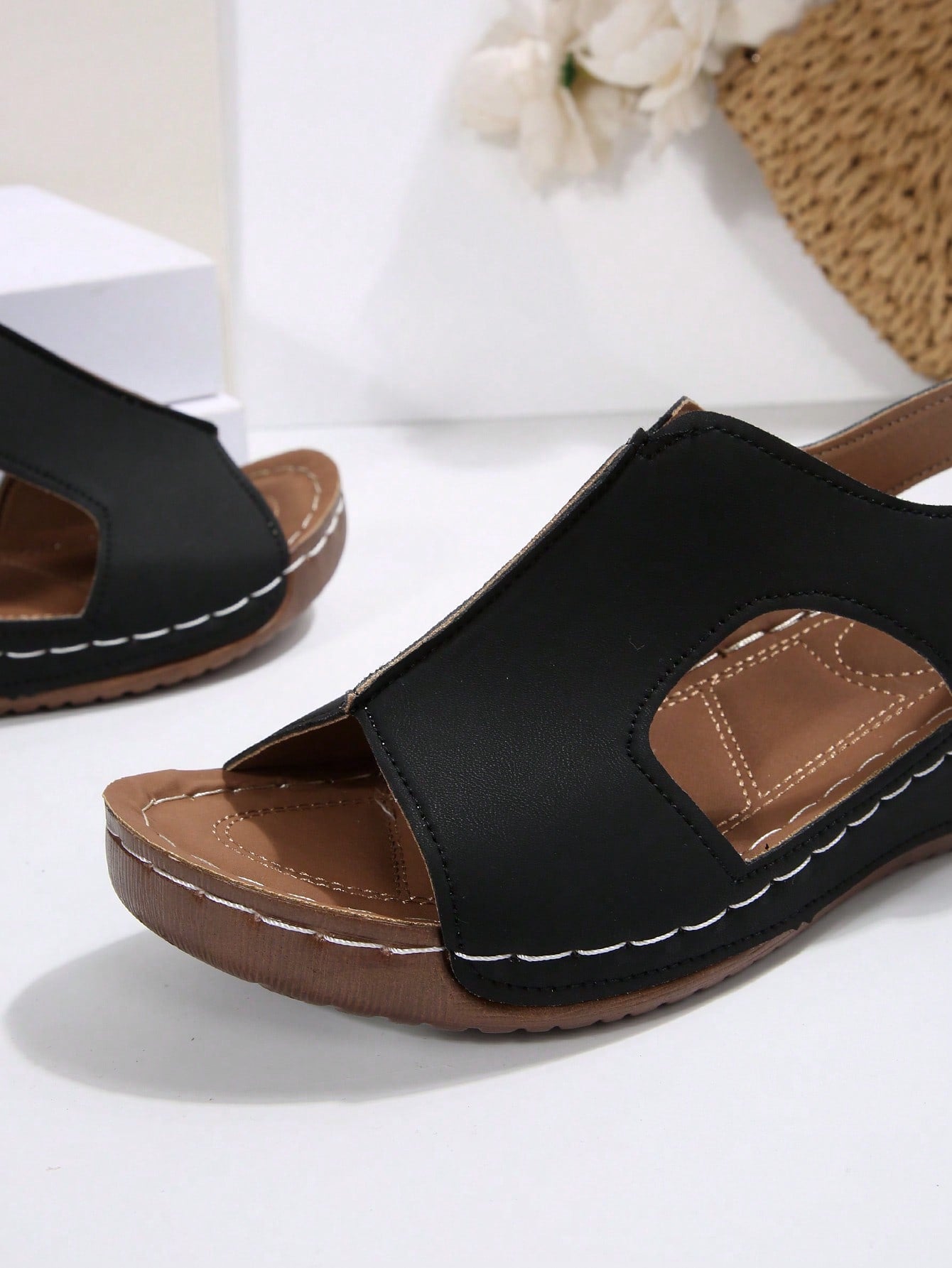 Women's color block platform flat sandals with open toe, criss-cross straps, and hook-loop closure, featuring a low heel thick sole design for casual vacation wear.
