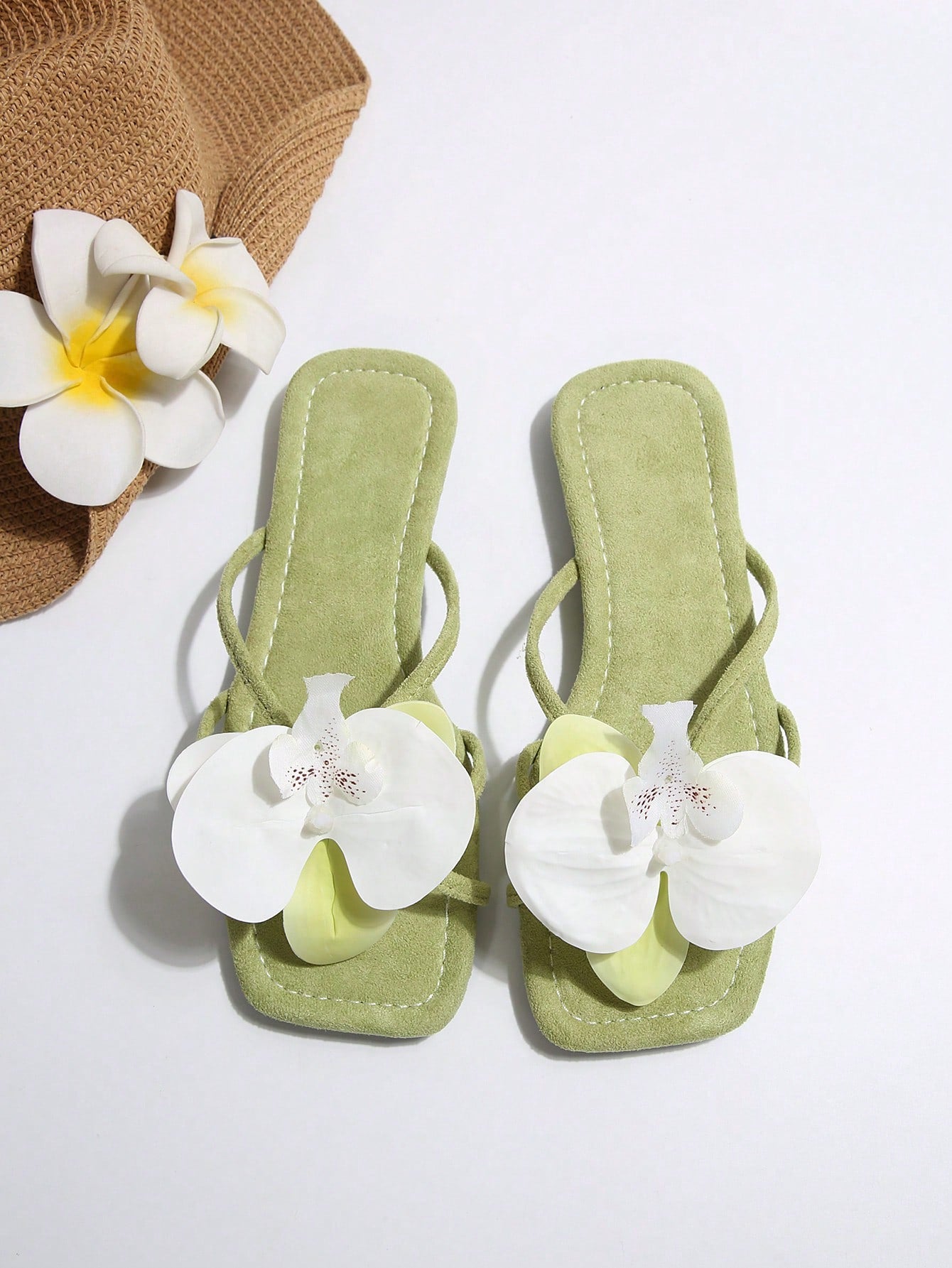 Women's open-toe flat slide sandals with a single strap and applique detail, glamorous casual style for beach and daily wear.
